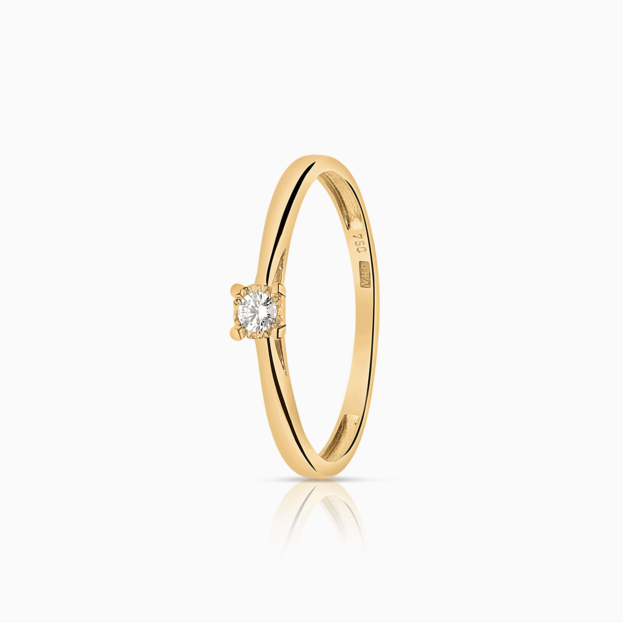 Solitaire ring 0.04ct 18K gold