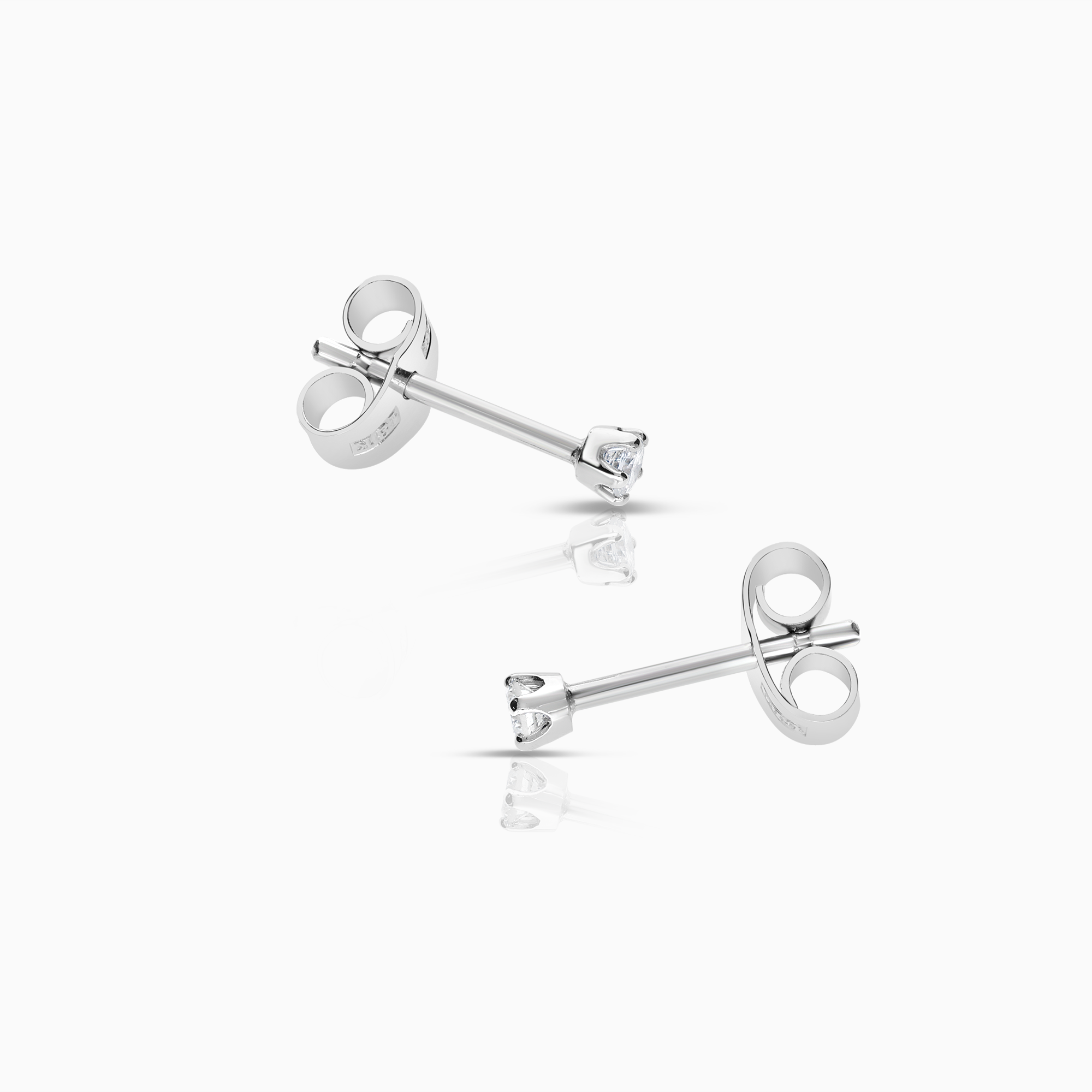 Solitaire earrings 0.10ct 18K white gold