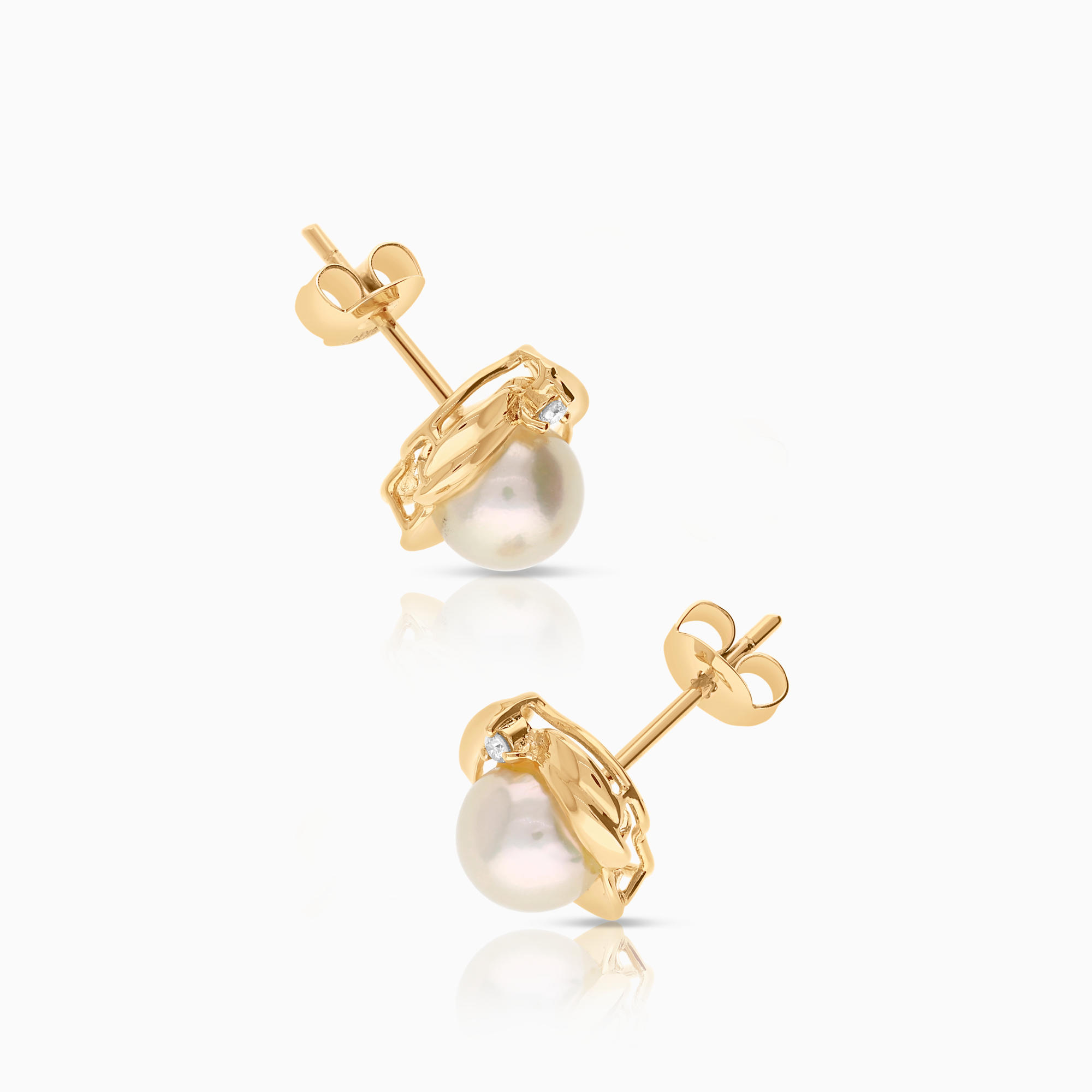 Örhängen odlade saltvattenspärlor, 0,03 ct, 2,86g 18K guld