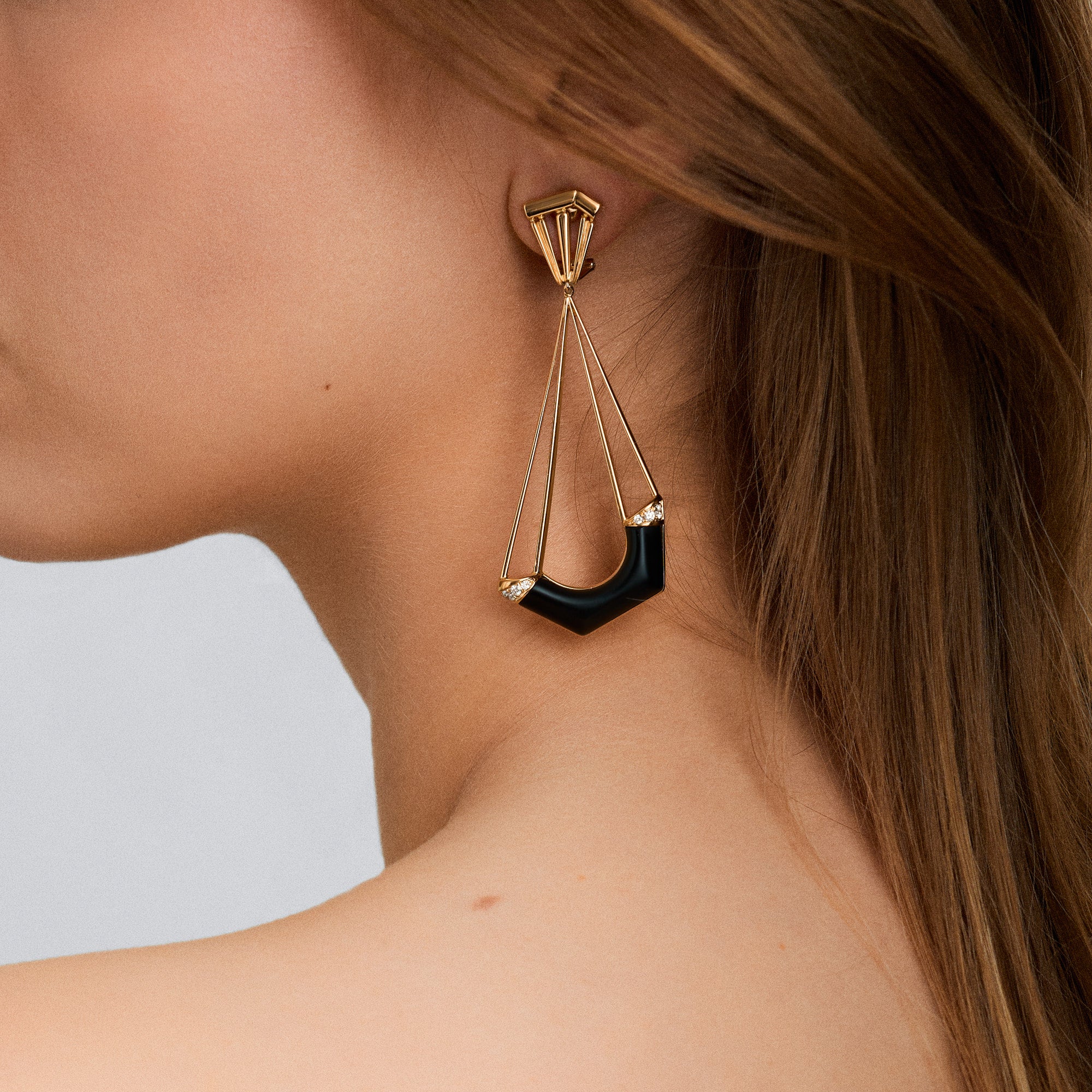 S.Egger clip-on earrings with onyx and diamonds 0.24ct 18K gold
