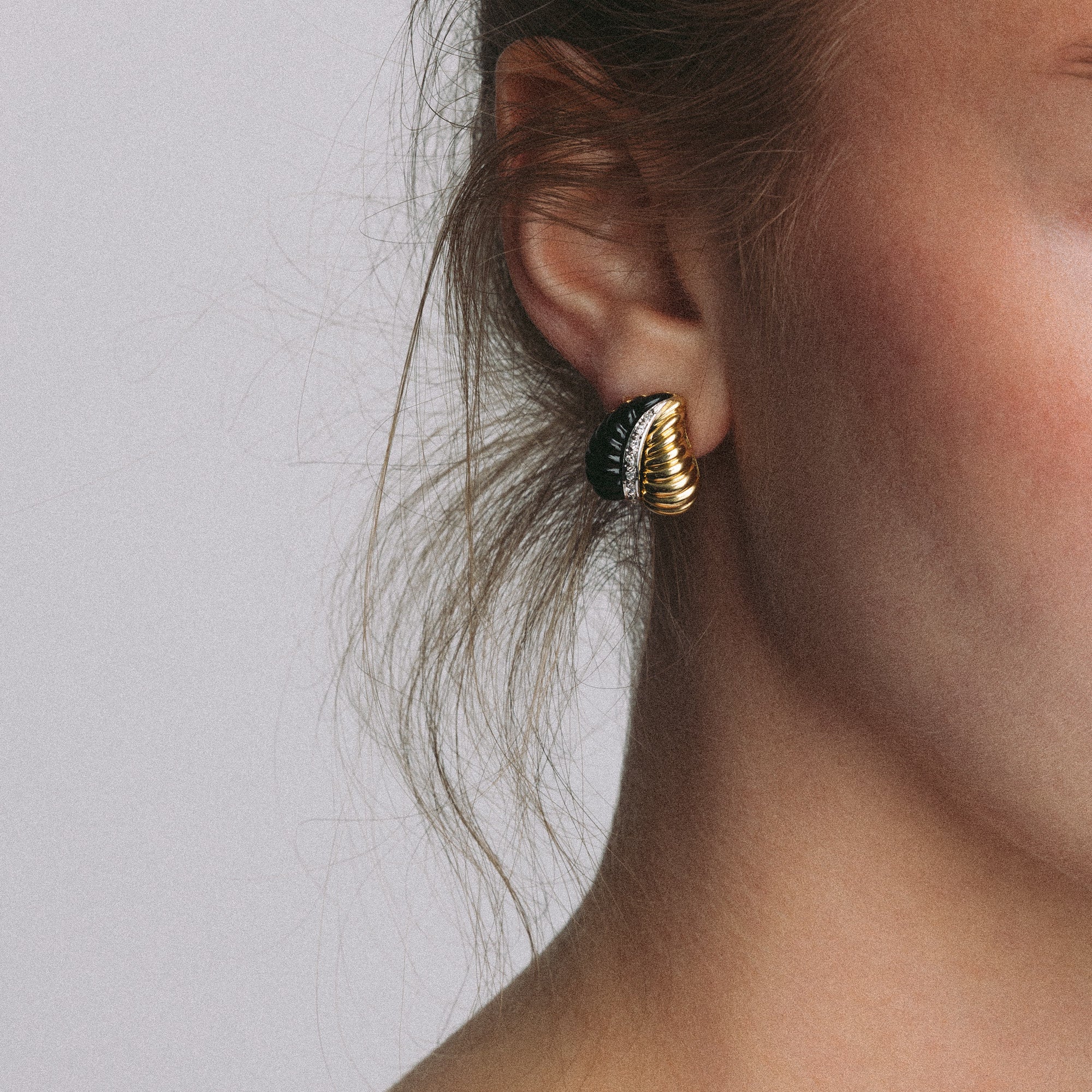 Clip-on earrings with carved onyx and diamonds 0.10ct 10.68g 18K gold