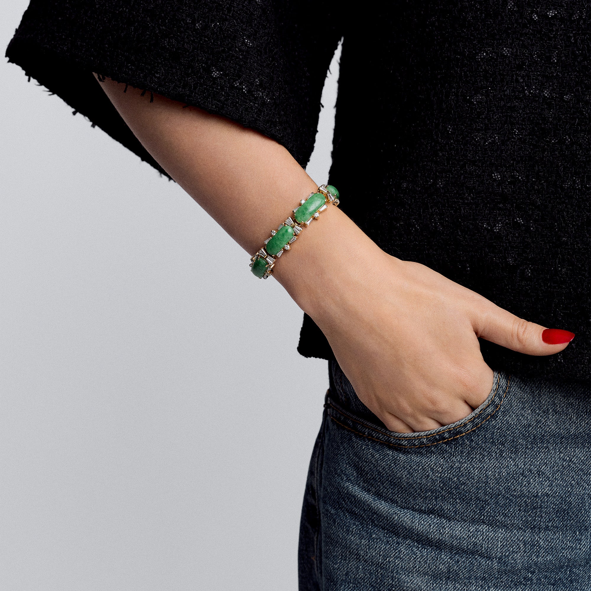 Guldarmband med gröna stenar 26,78g 18K guld