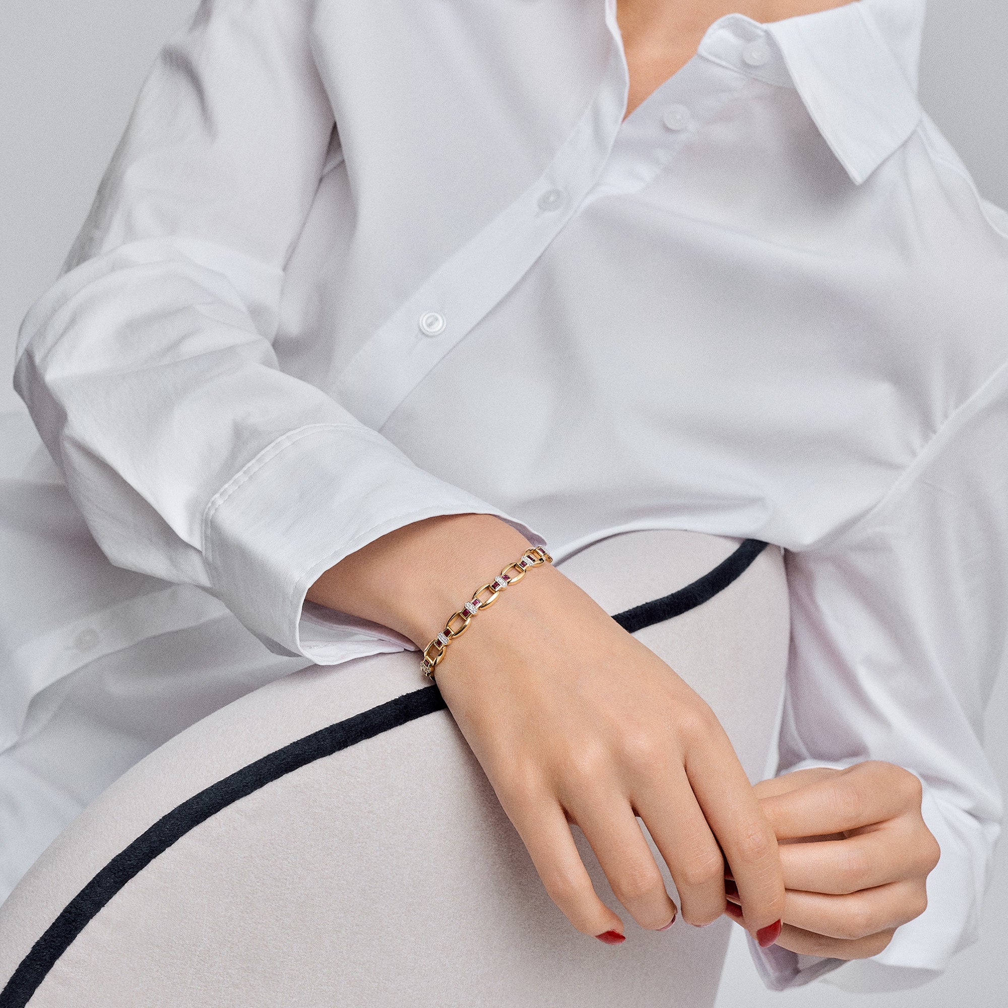 Diamantarmband med rubiner 0,22ct 18K guld