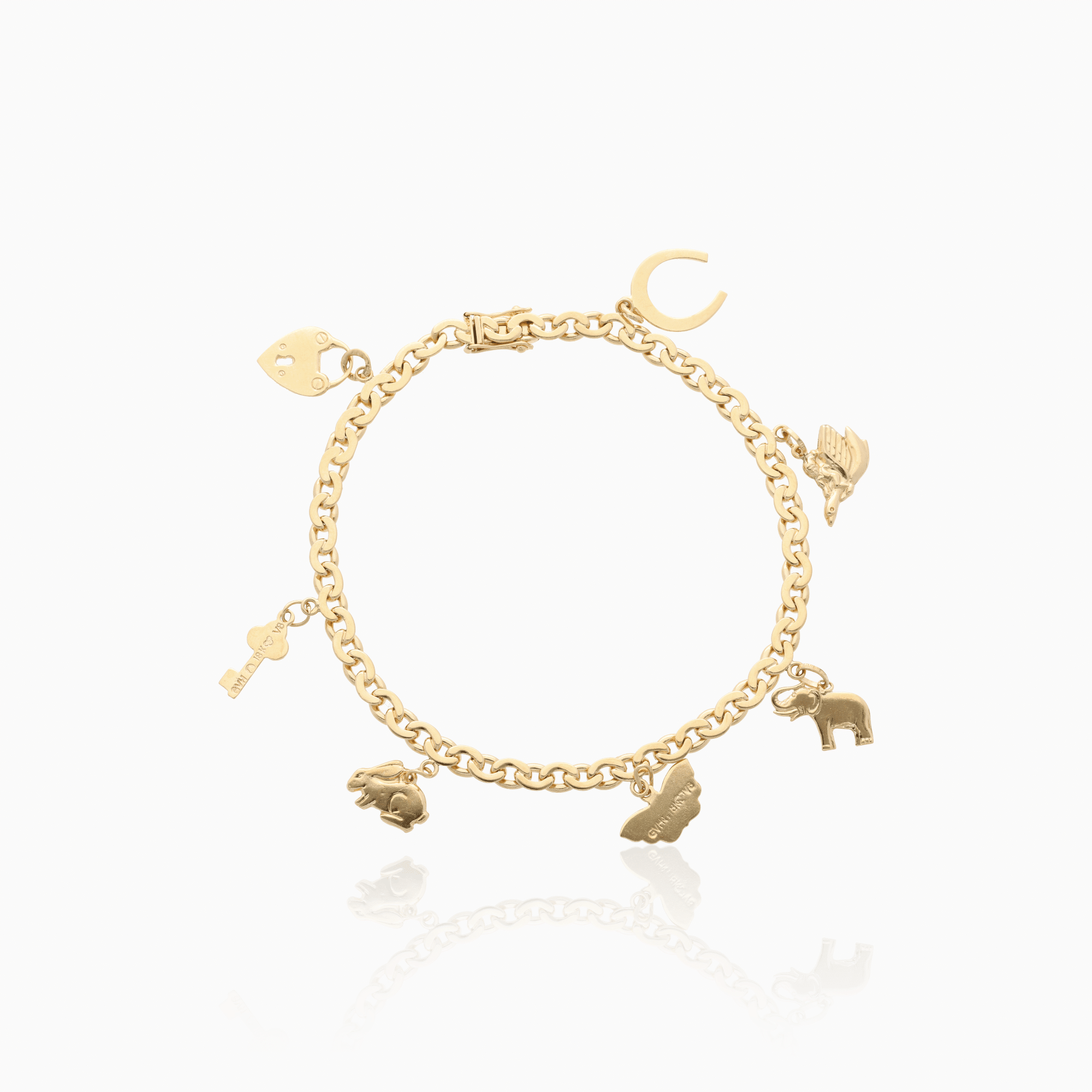 S-länk armband berlocker 16,8g 18K guld
