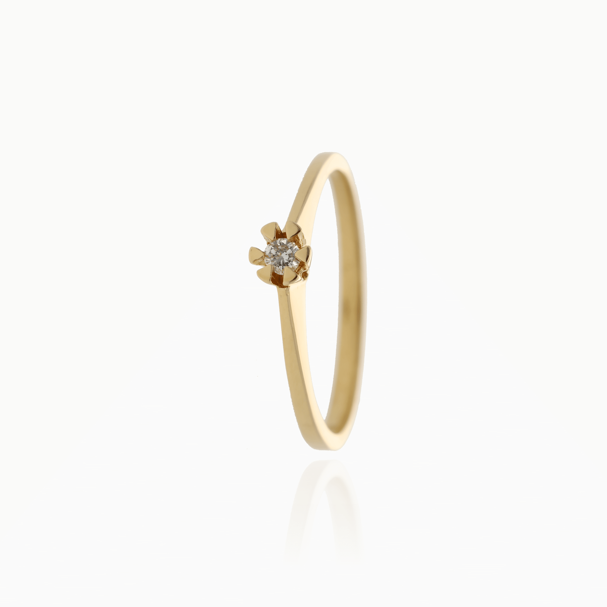 Solitaire ring 0.04ct 18K
