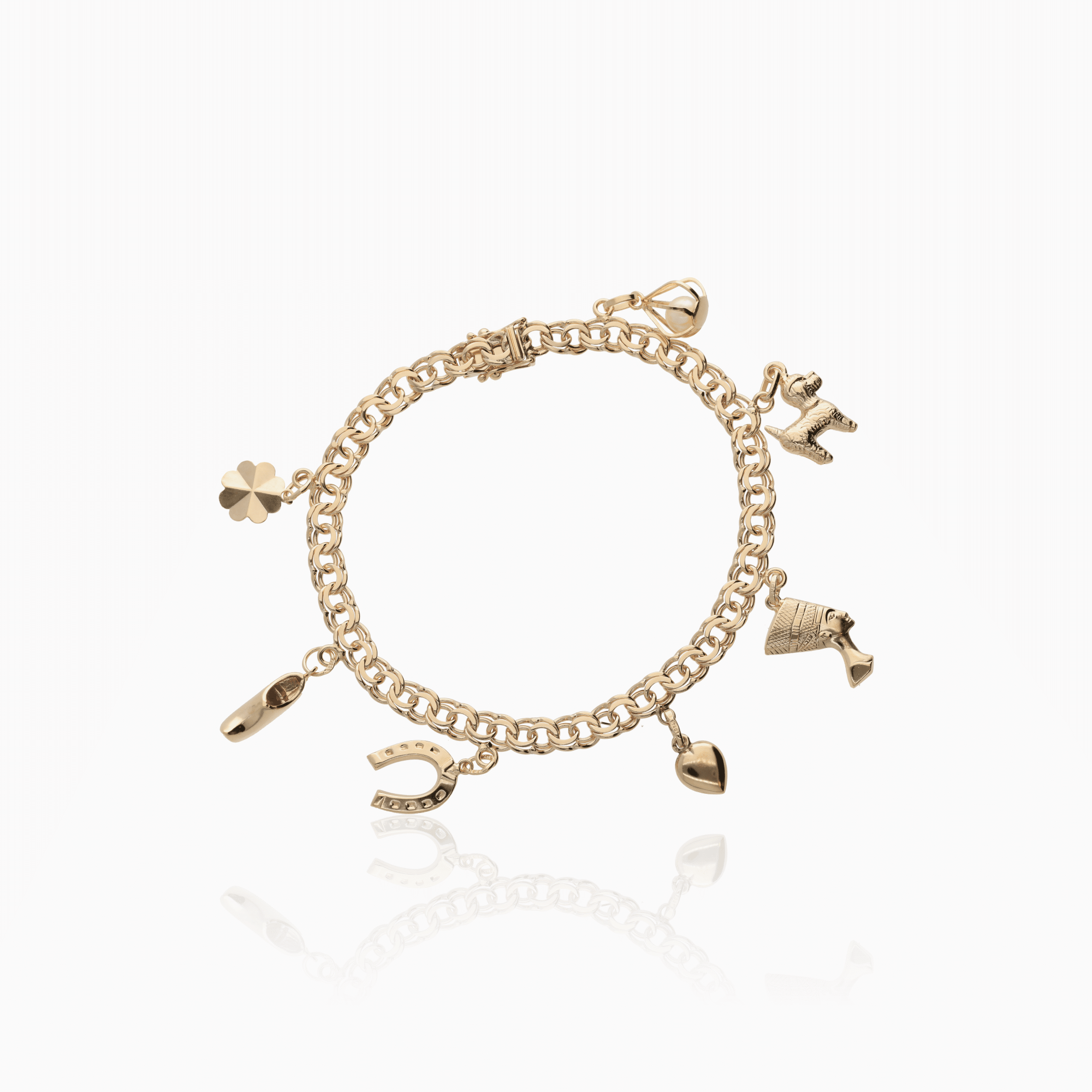 Bismarck bracelet with charms 17.38g 18K gold