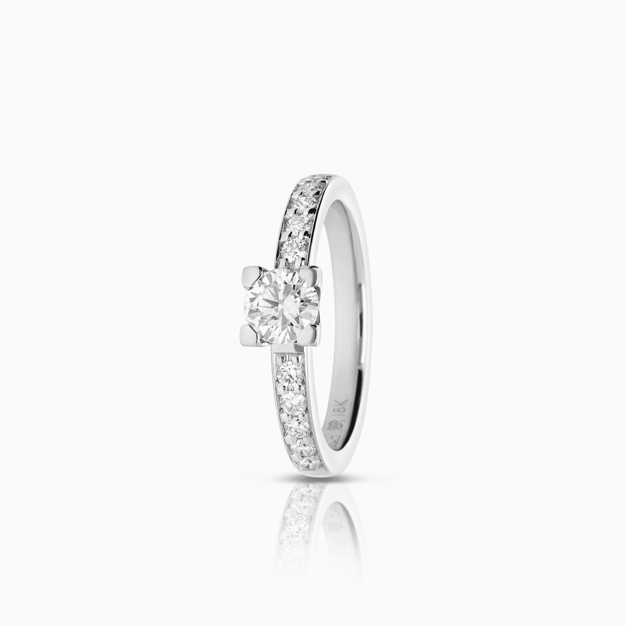 Sidostensring 0,60ct 18K vitguld