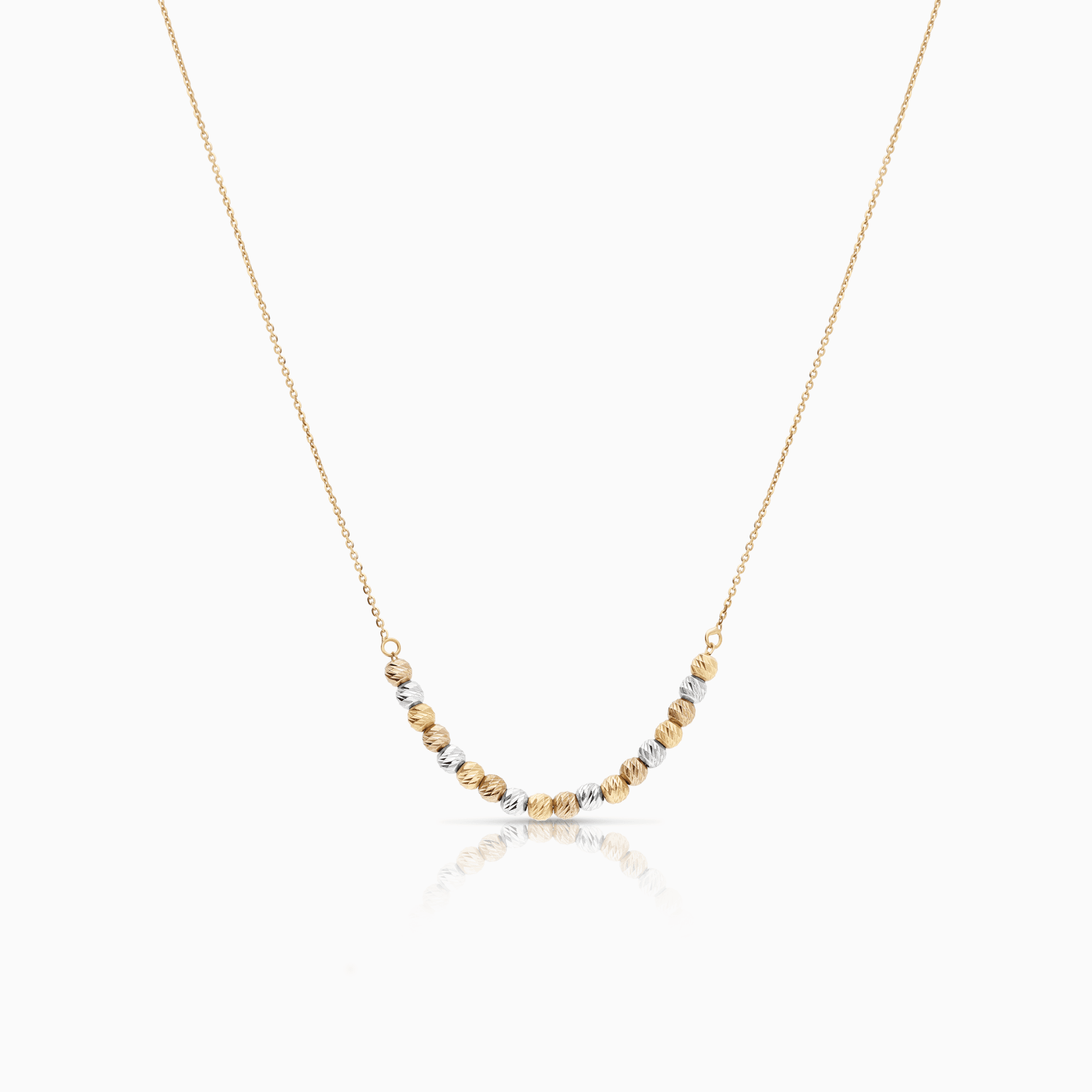 Gold necklace with beads 2.34g 18K yellow/rose/white gold
