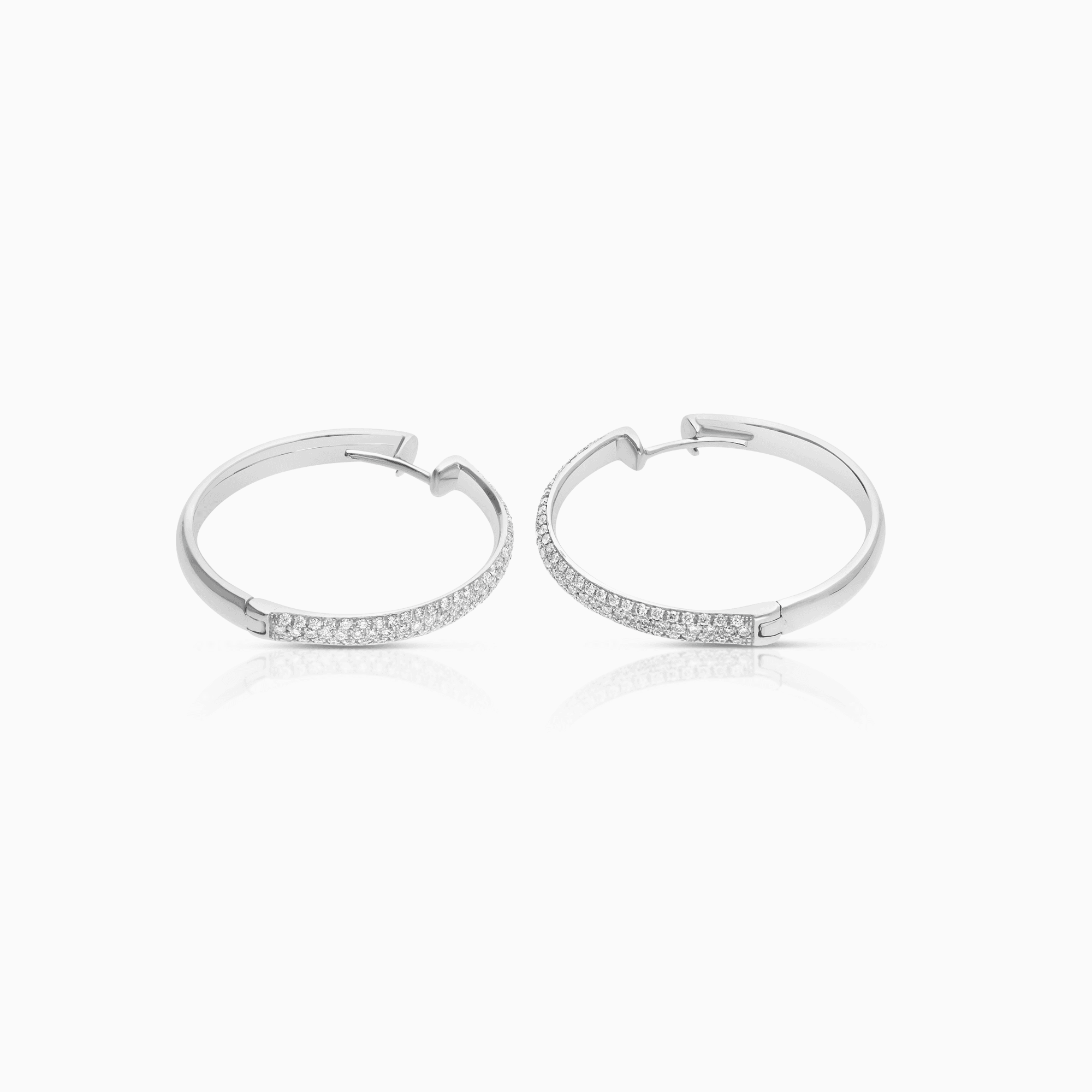 Creoler med diamanter 0,92ct 18K vitguld