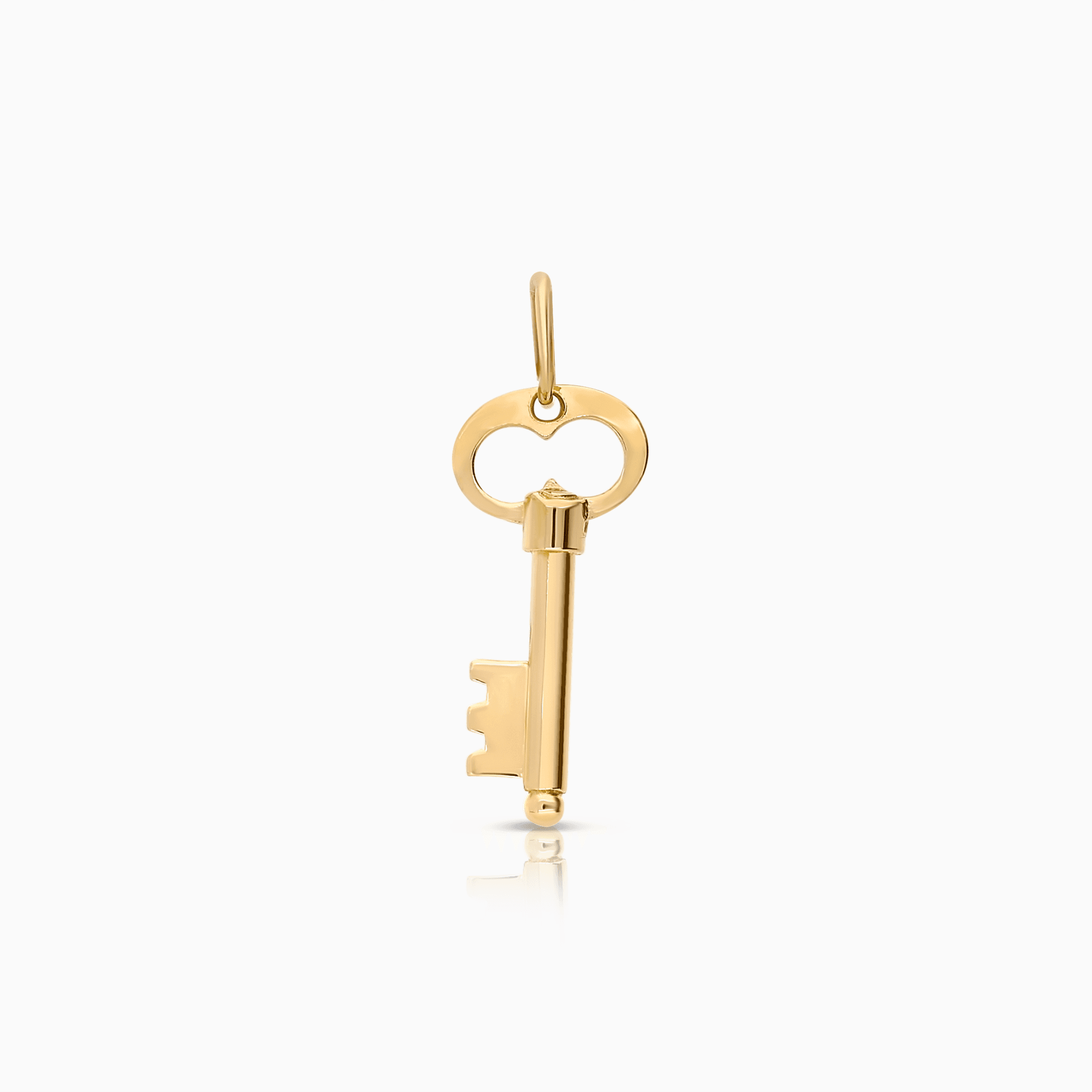Key pendant 0.64g 18K gold