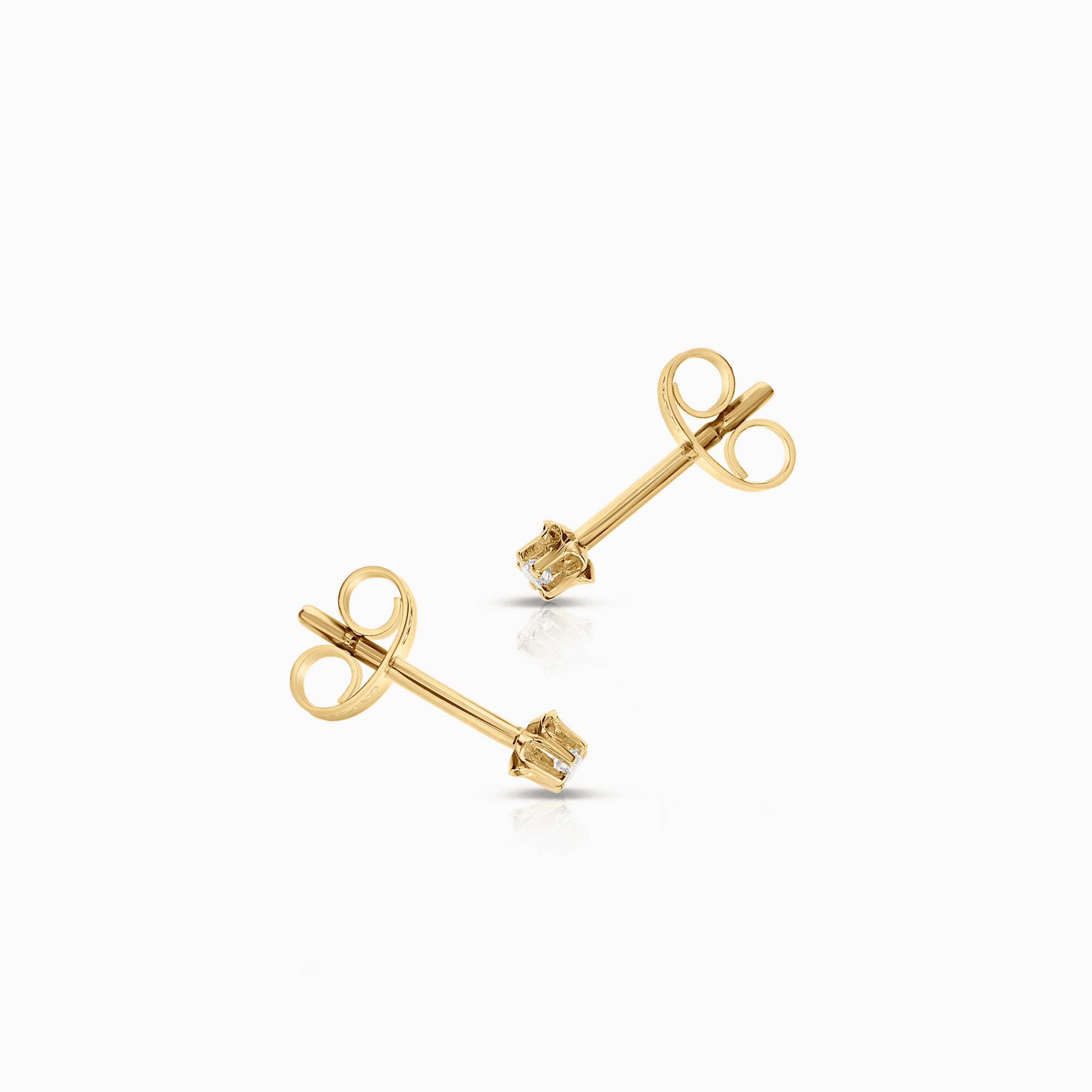 Solitärörhängen 0,04ct 18K guld