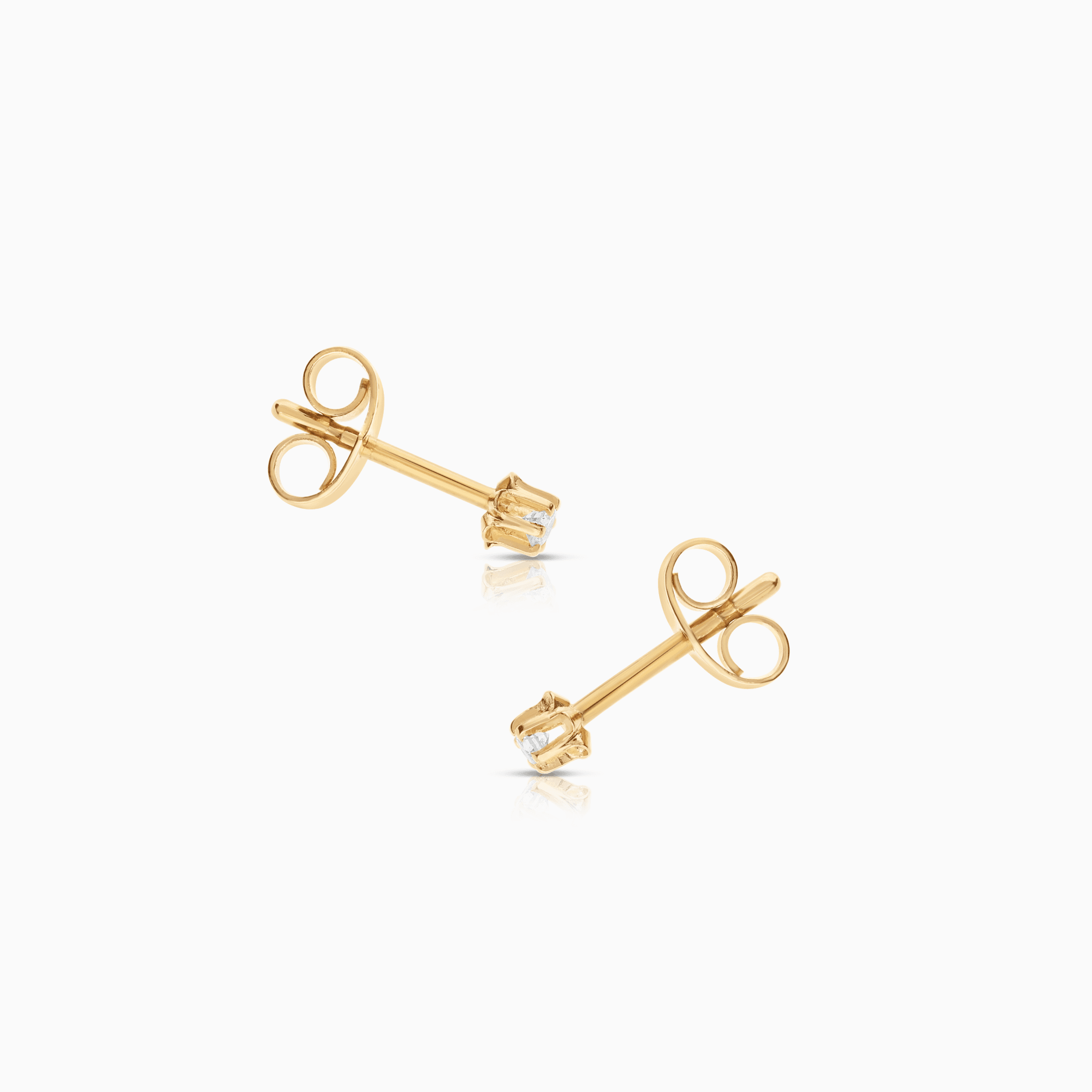 Solitaire earrings 0.06ct 18K gold