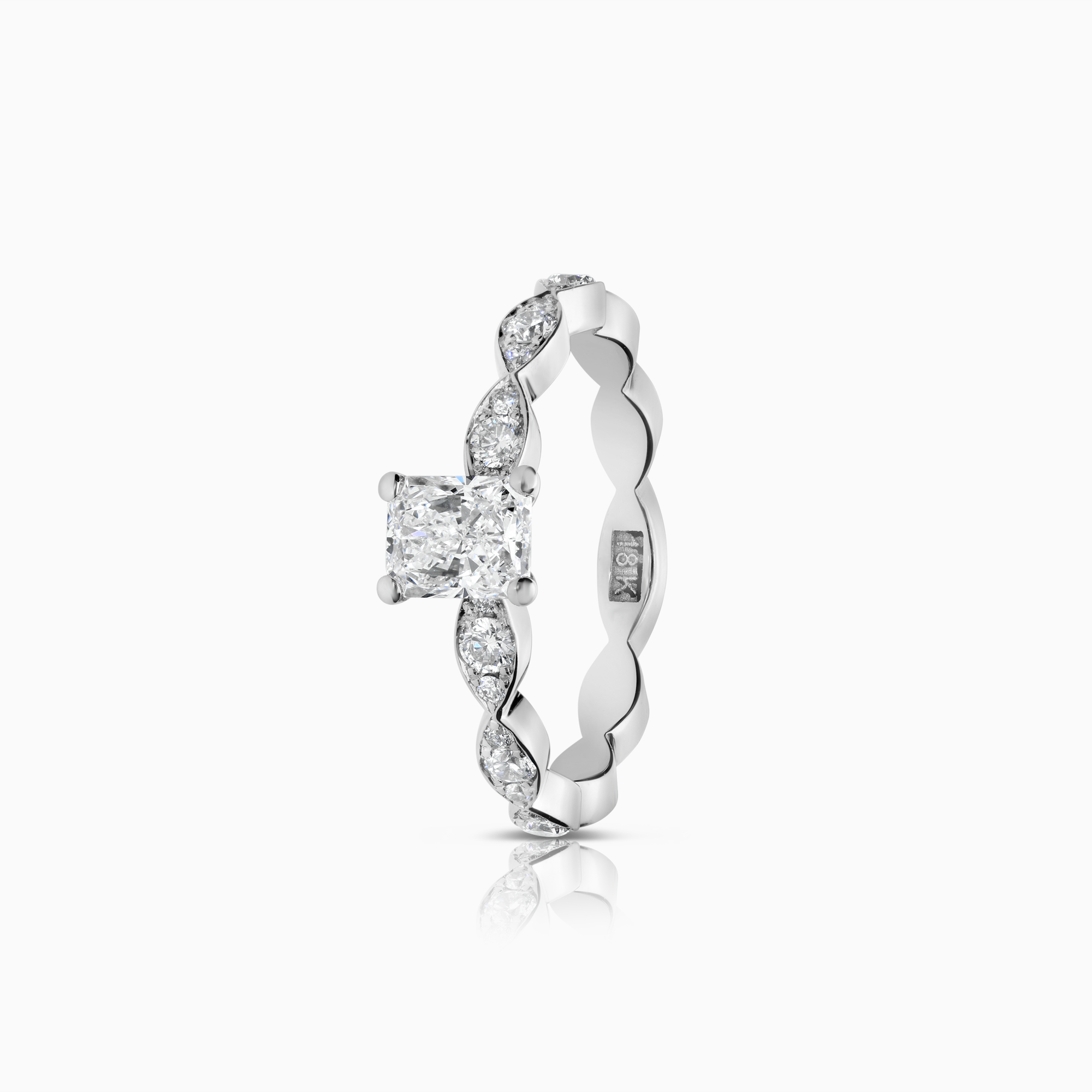 Sidostensring 0,74ct 18K vitguld