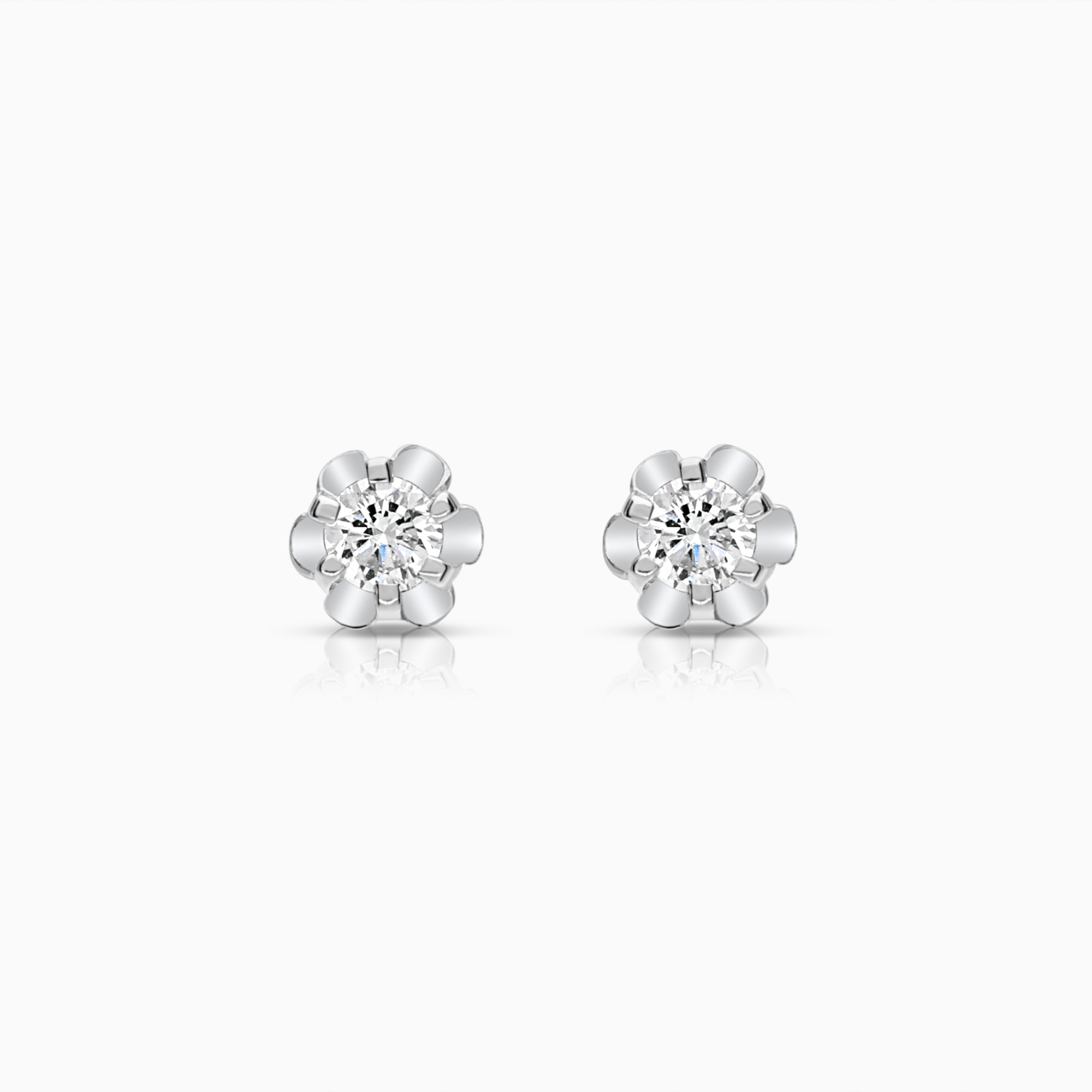 Solitaire earrings 0.06ct 18K white gold