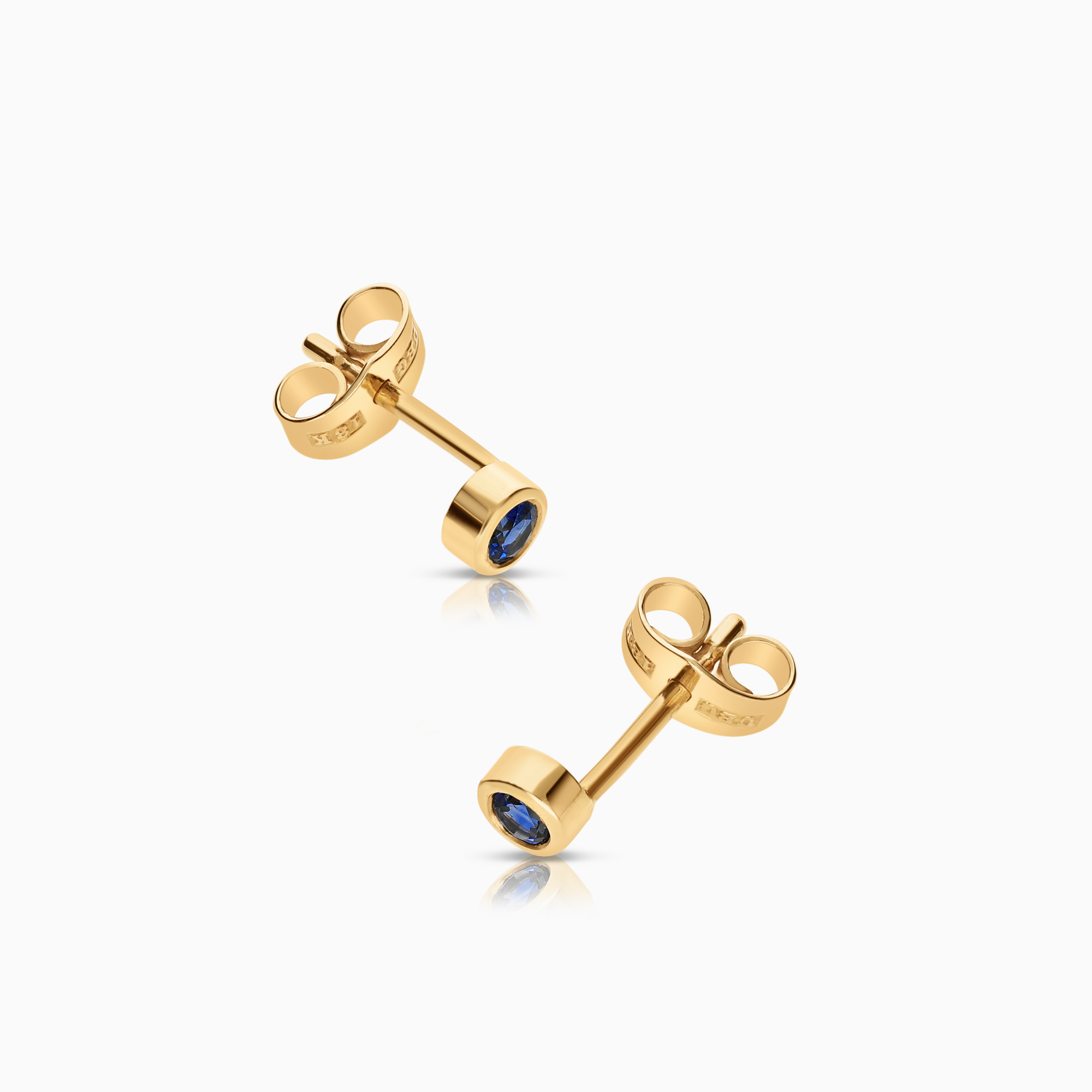 Solitaire earrings with blue sapphires 18K gold