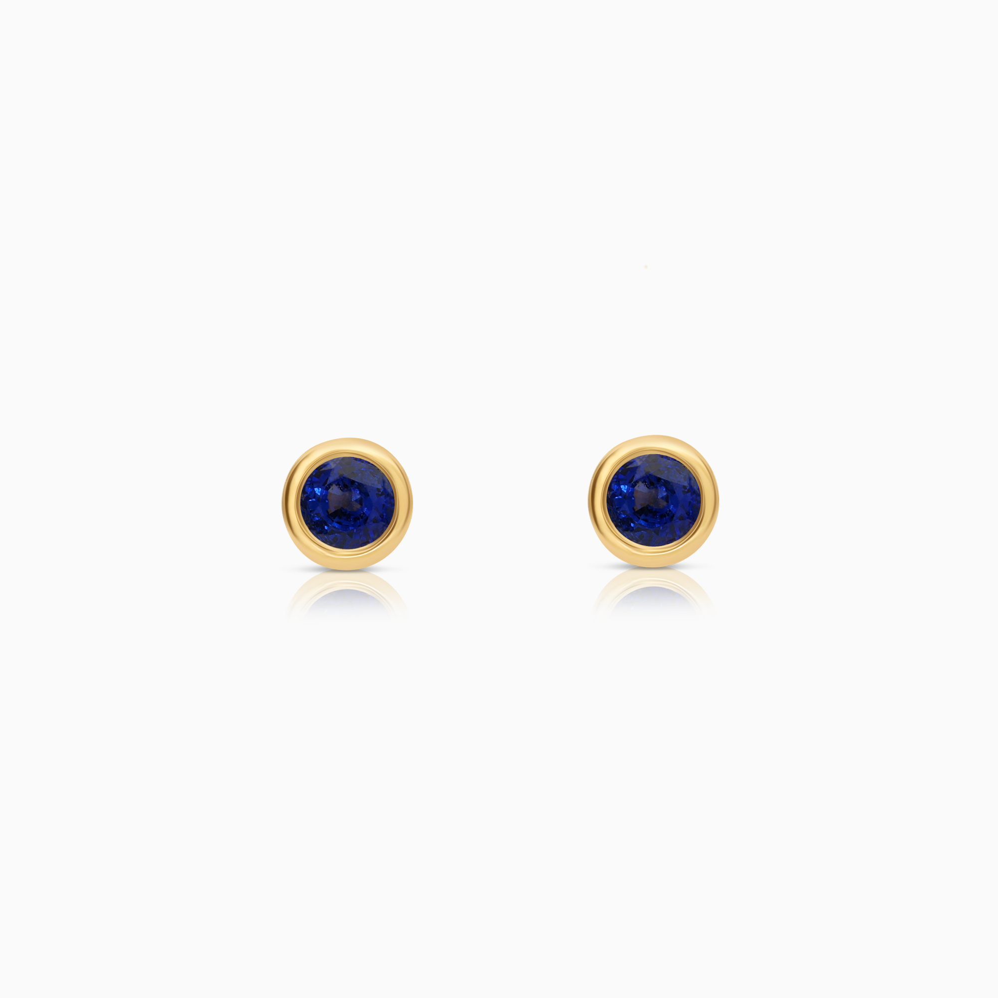 Solitaire earrings with blue sapphires 18K gold