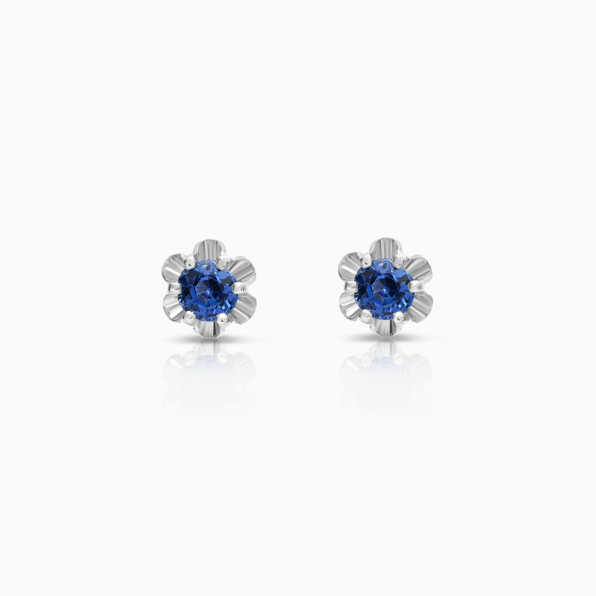 Solitaire earrings with blue sapphires 1.46g 18K white gold