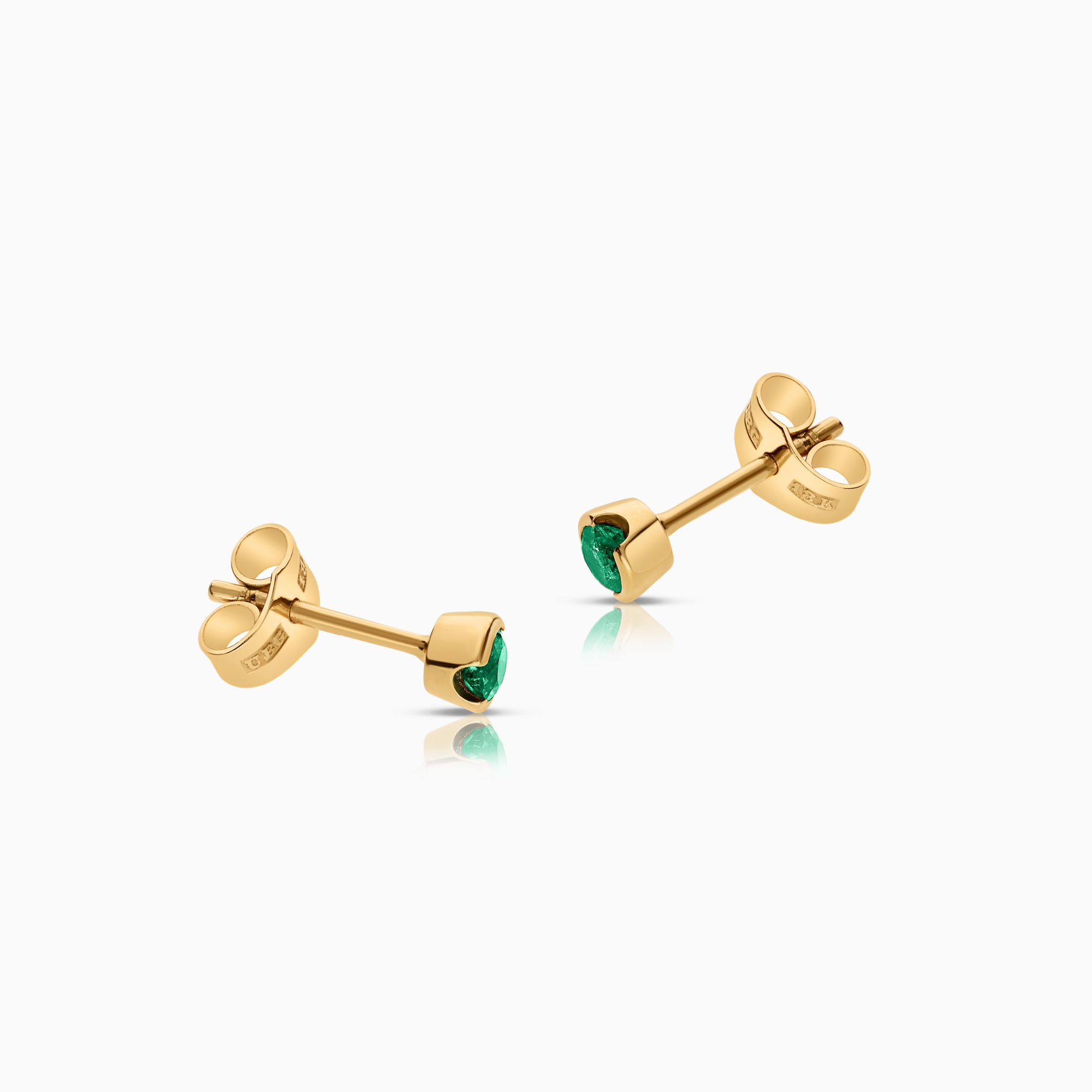 Solitaire earrings with green emeralds 18K gold