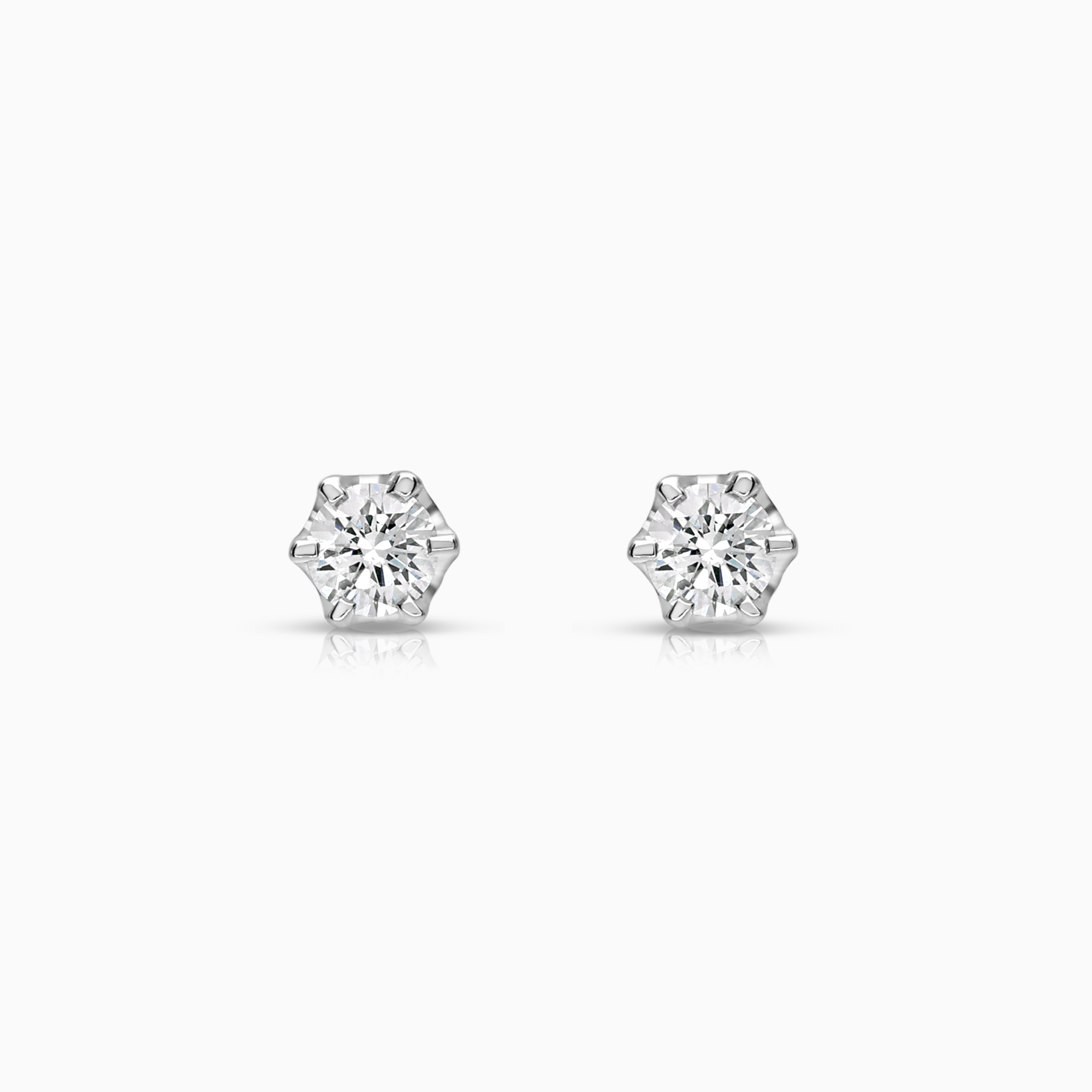 Solitärörhängen 0,20ct 18K vitguld