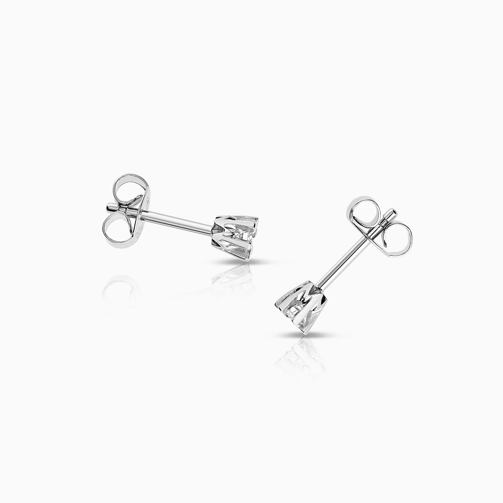 Solitärörhängen 0,14ct 18K vitguld