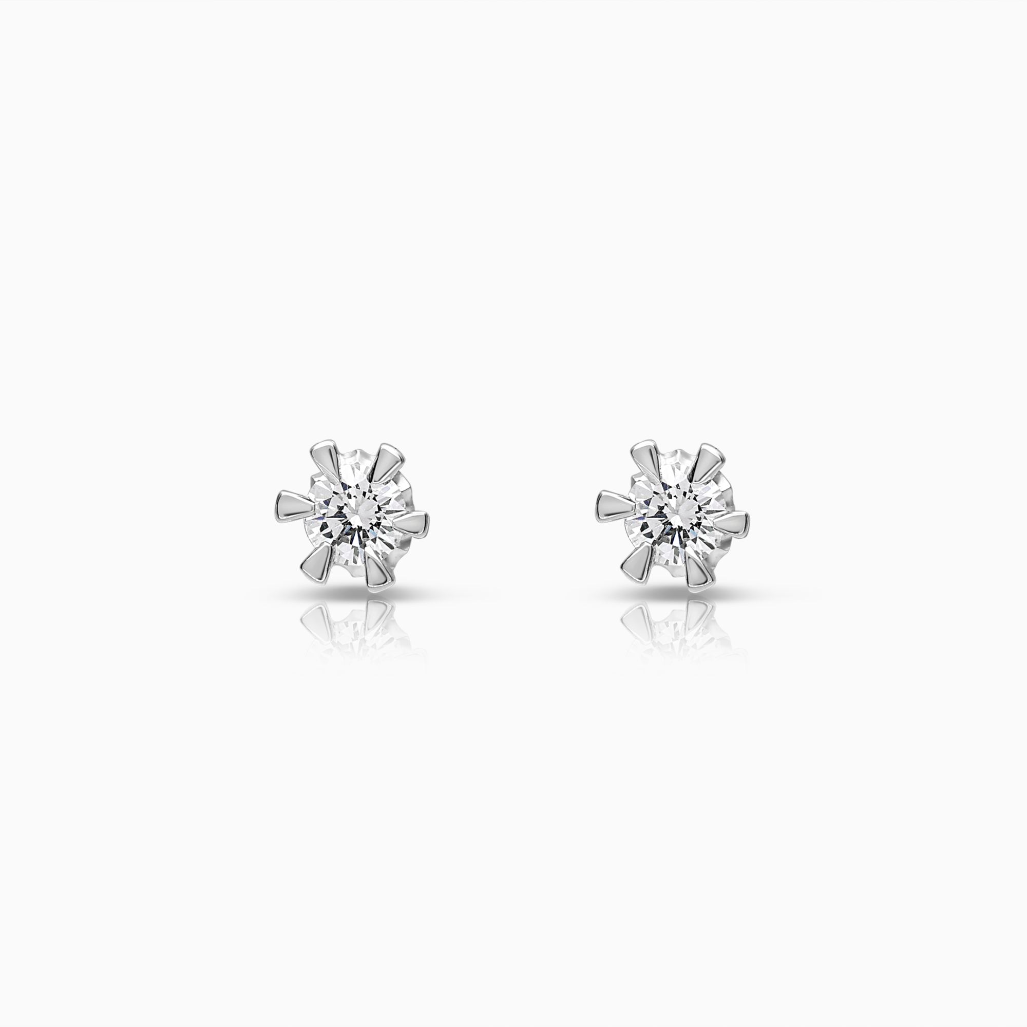 Solitärörhängen 0,14ct 18K vitguld
