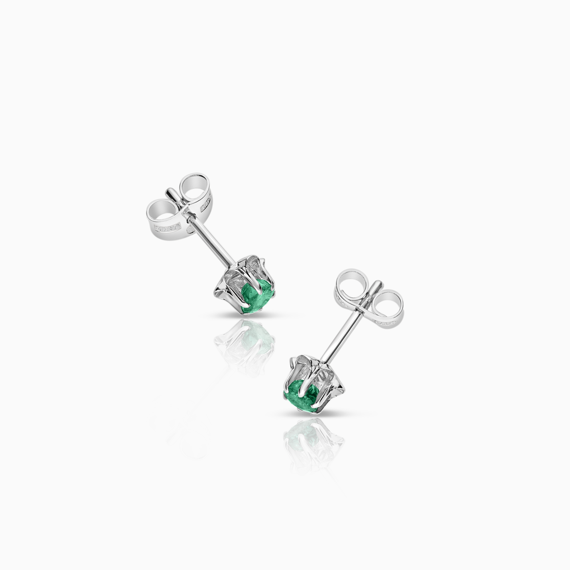 Solitaire earrings with emeralds 1.29g 18K white gold