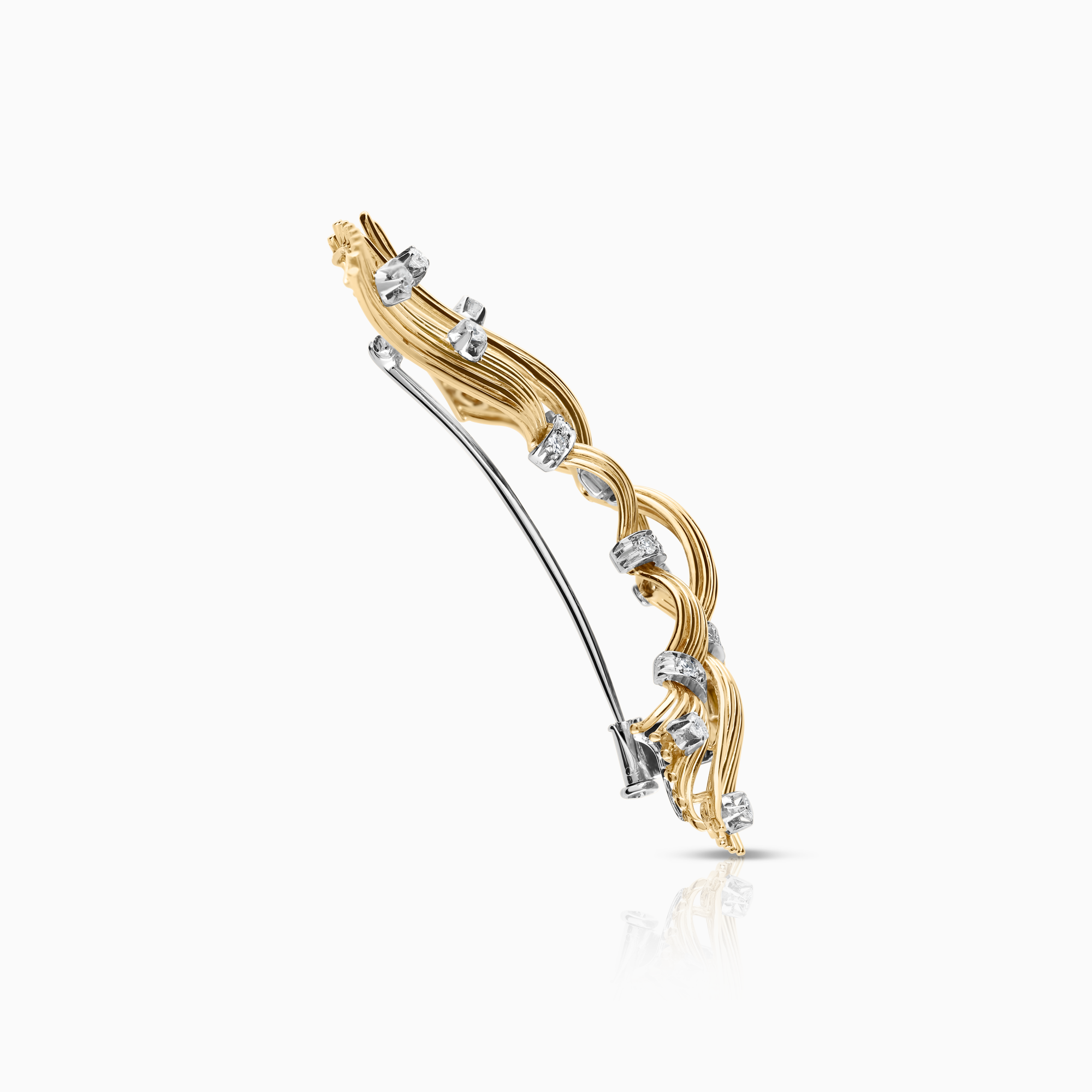 Diamantbrosch 0,66ct 18K guld
