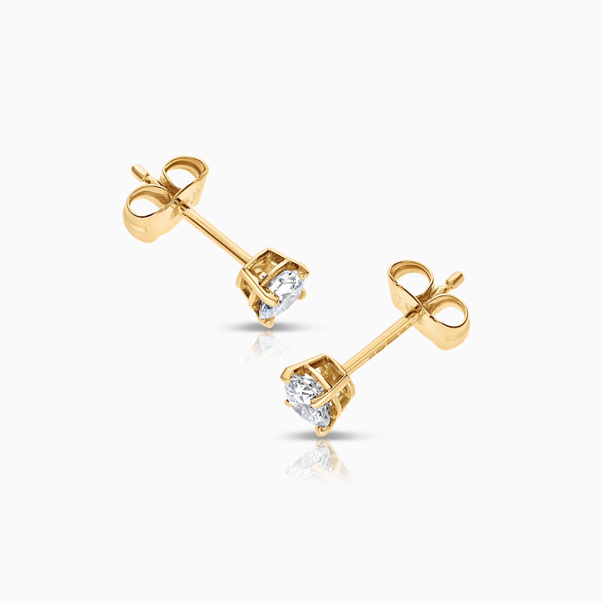 Solitaire øredobber 0,62ct 18K gull