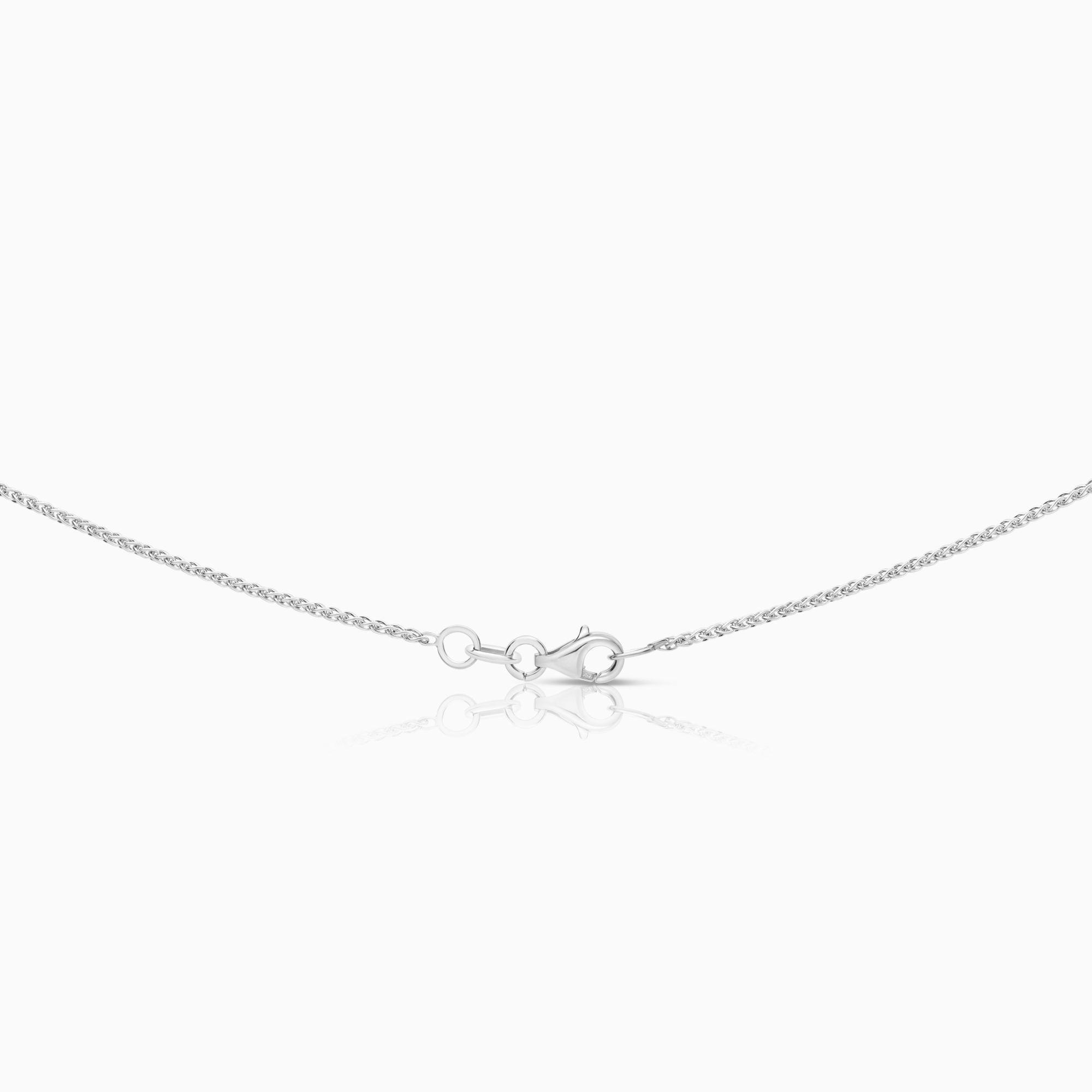 Halsband med kors 0,08ct 18K vitguld