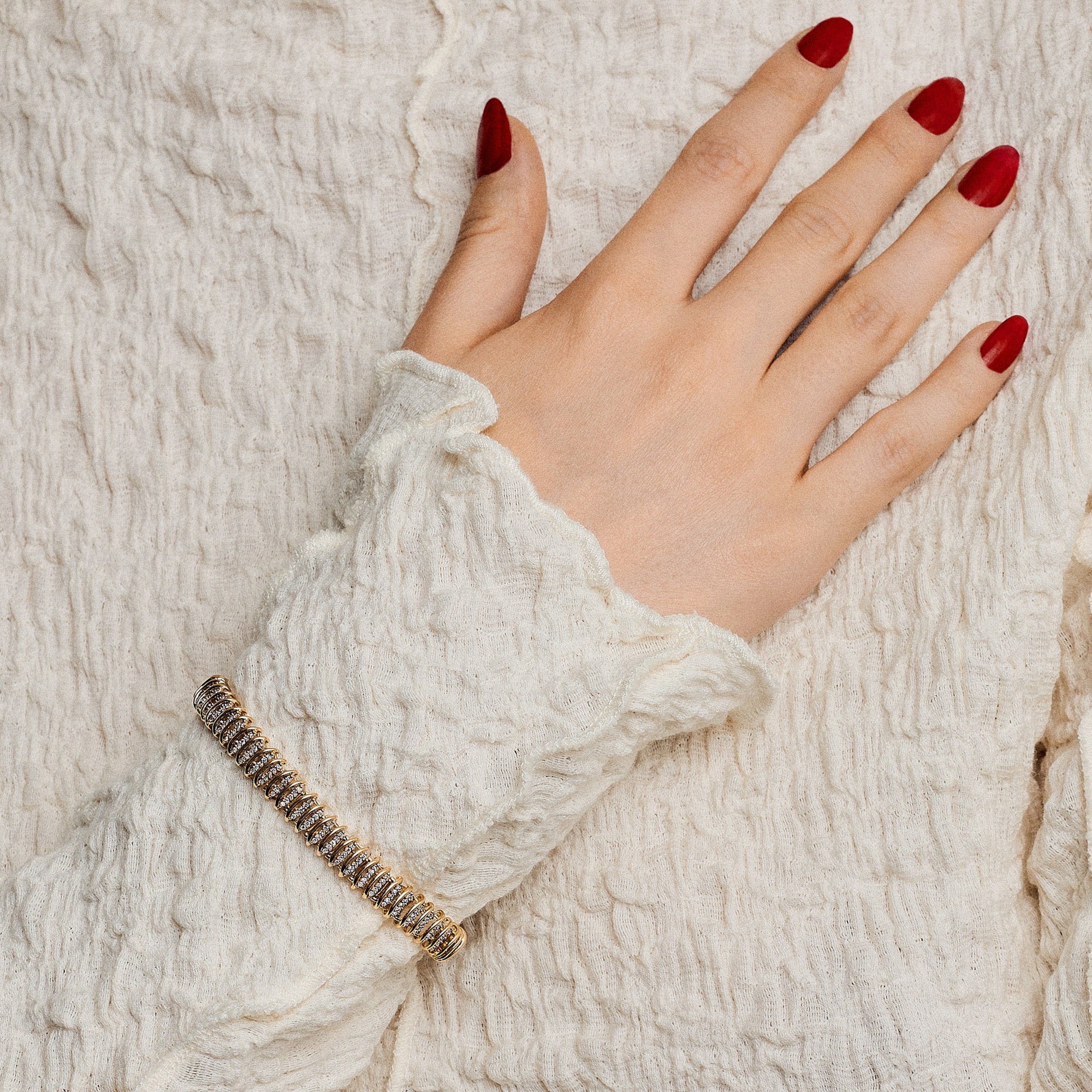 Diamantarmband 0,65ct 18K guld