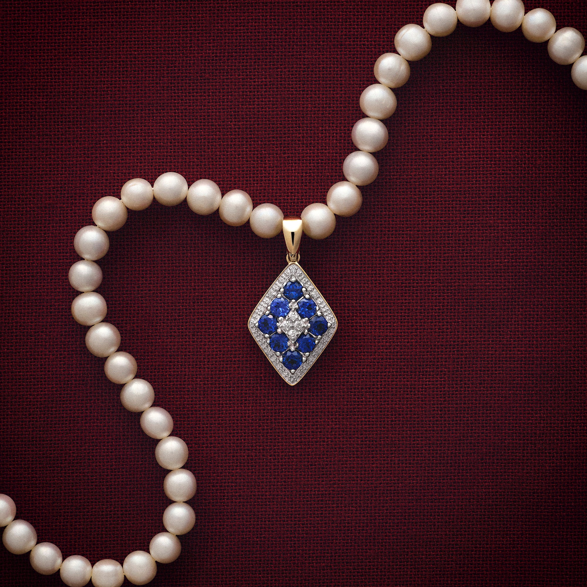 Pendant with diamonds 0.08ct and sapphires 9K gold