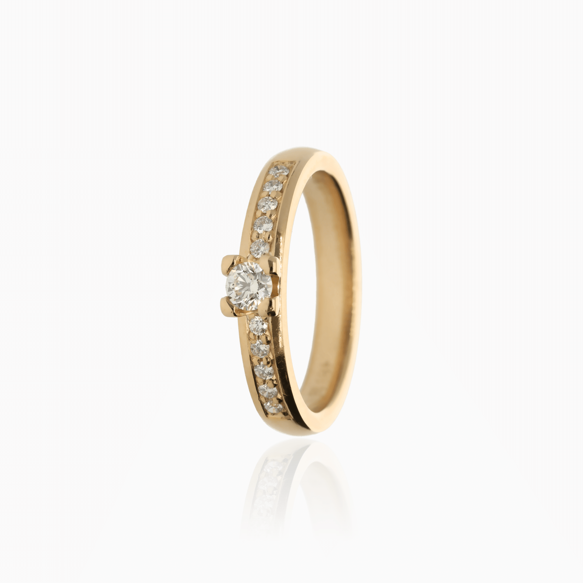 Side stone ring 0.20ct 18K