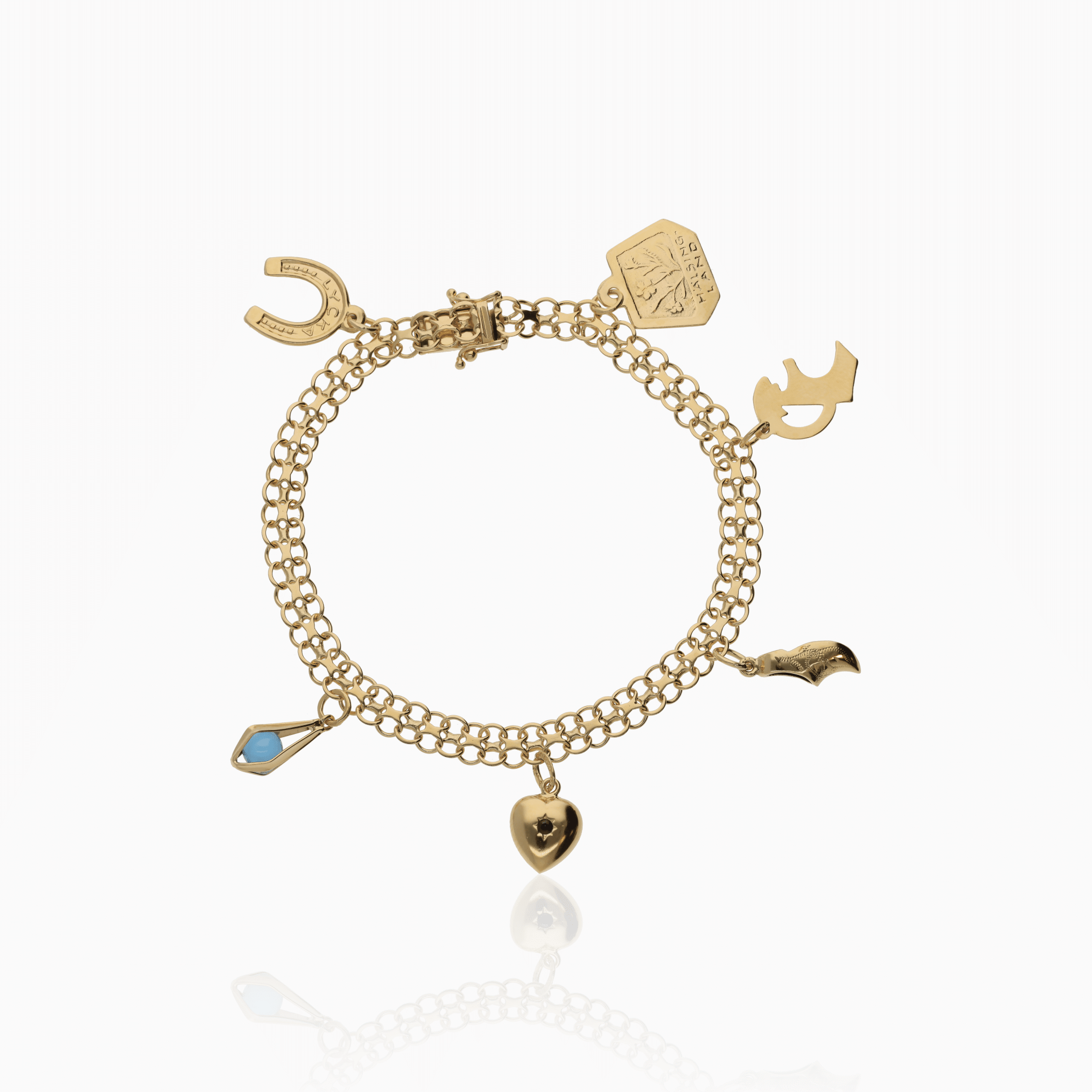 X-länk armband med berlocker 10,65g 18K guld