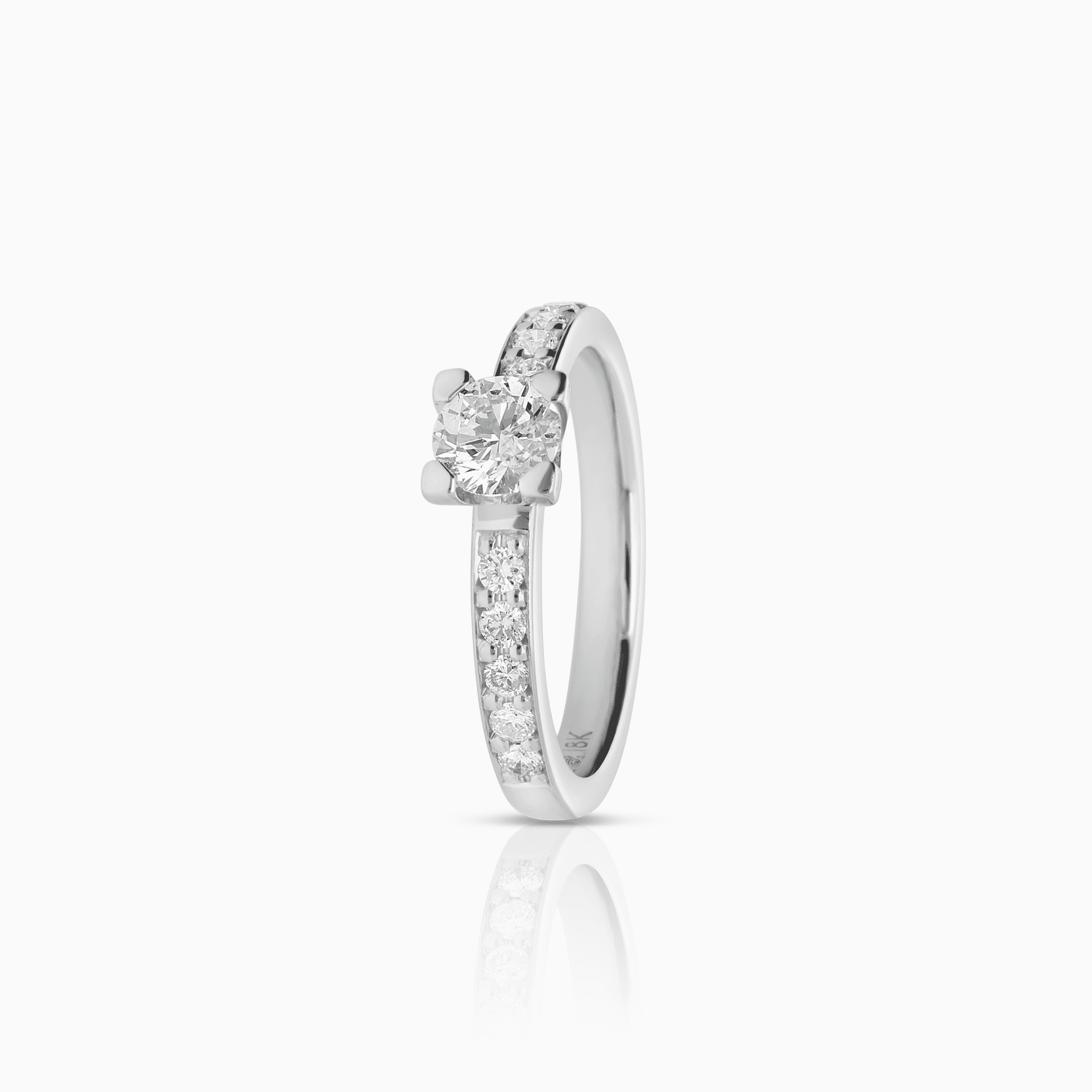 Sidostensring 0,60ct 18K vitguld