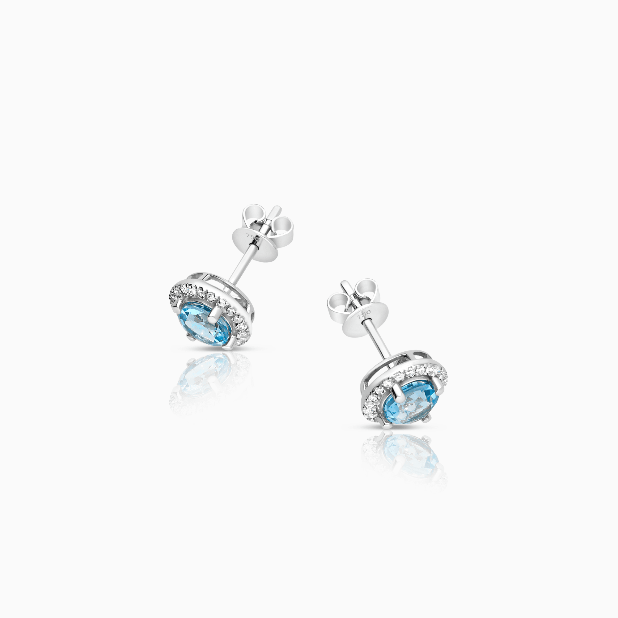 Diamond earrings with blue topazes 2.12g 18K white gold