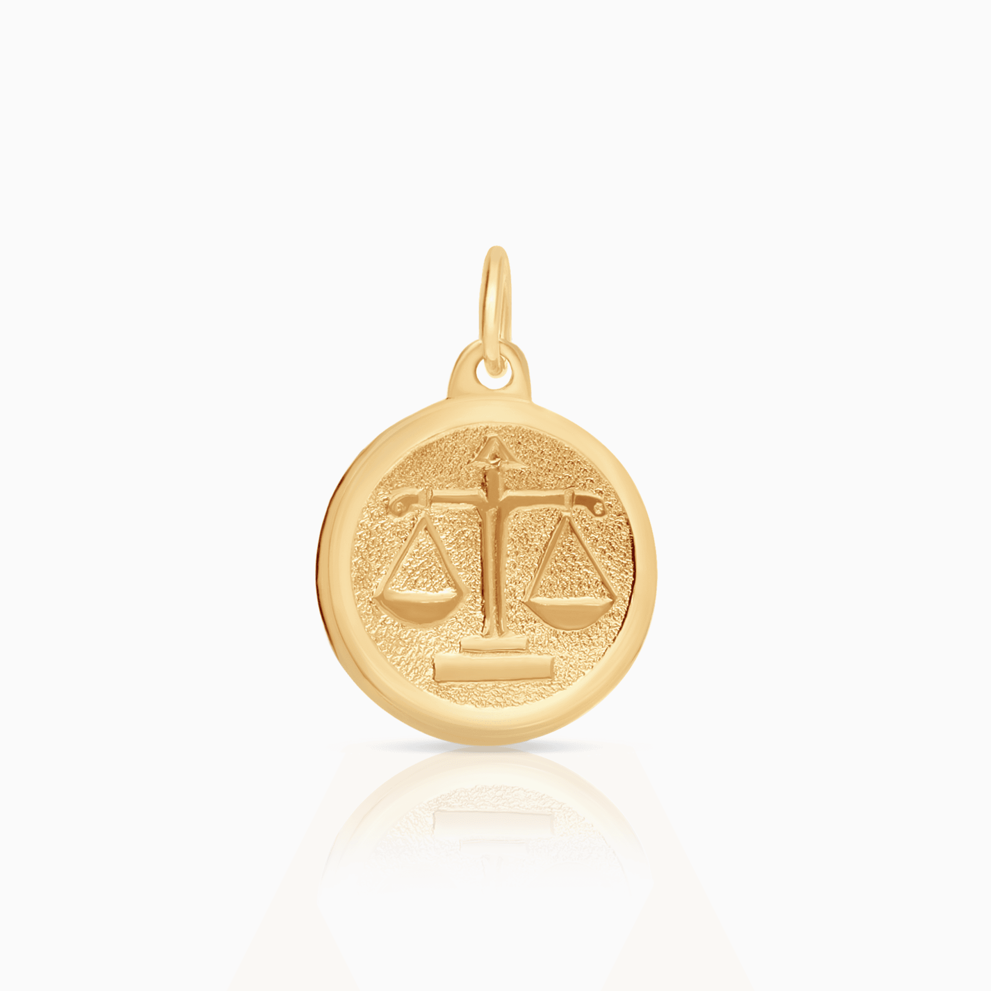 Hängsmycke våg 0,72g 18K guld