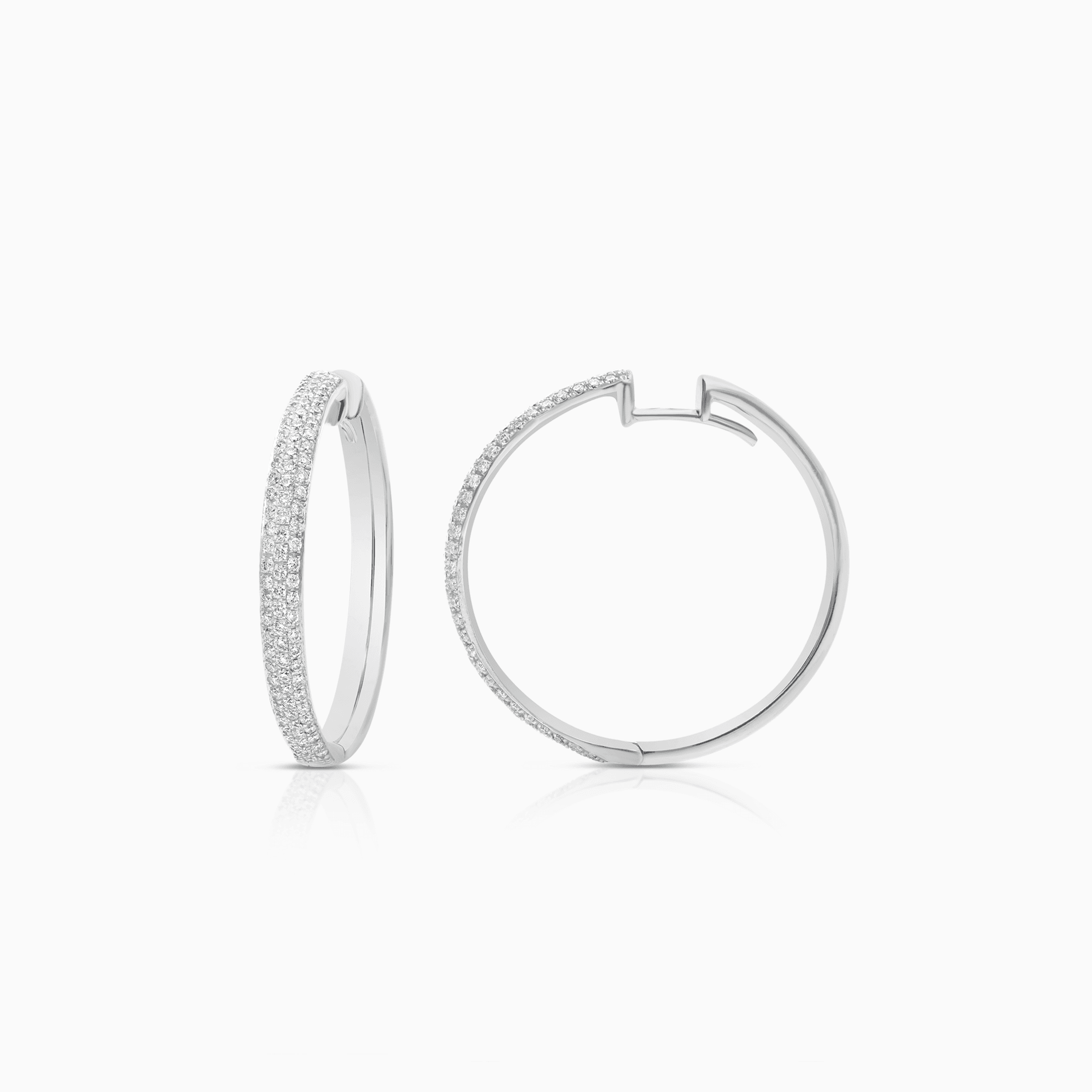 Creoler med diamanter 0,92ct 18K vitguld