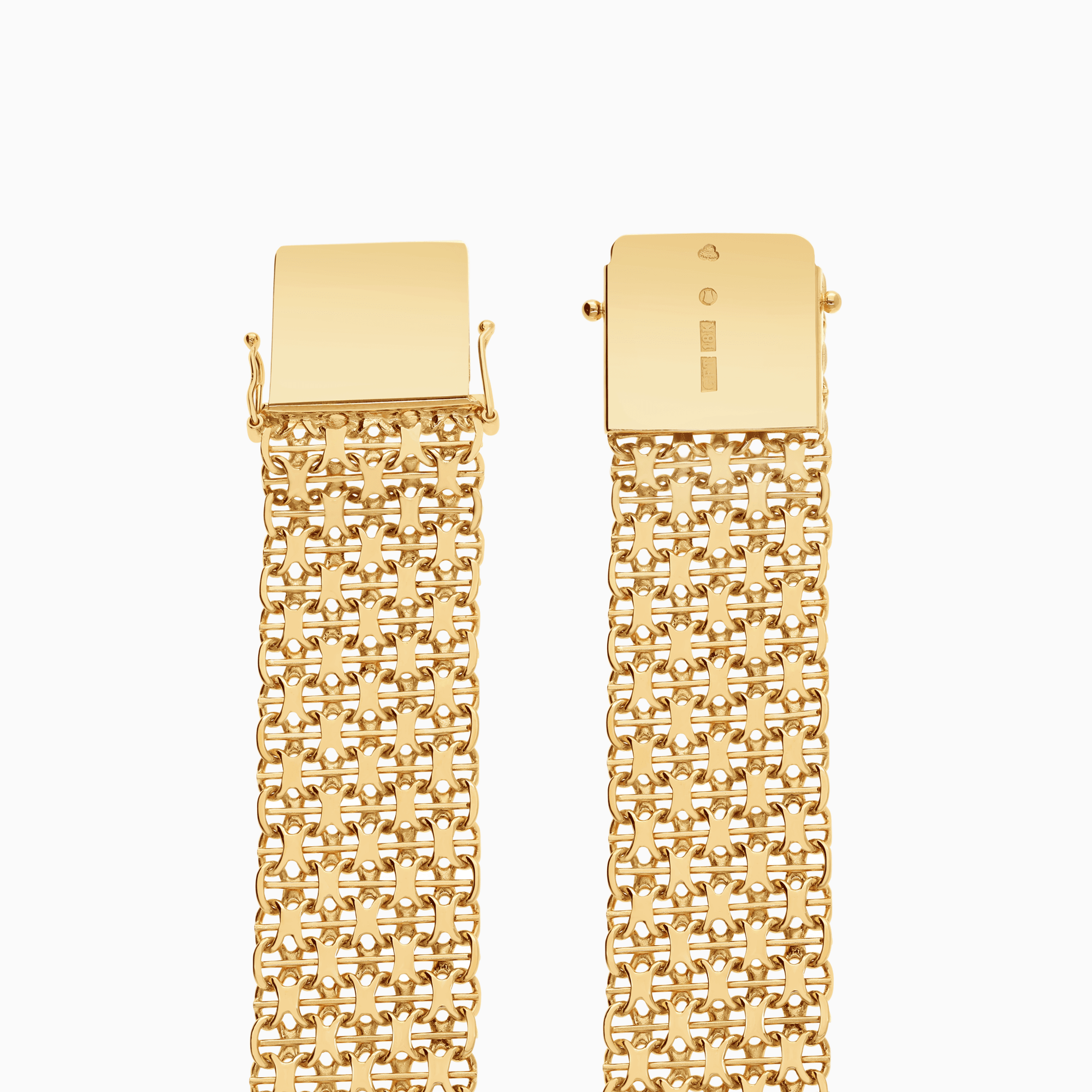 X-länk armband med stav 35,21g 18K guld