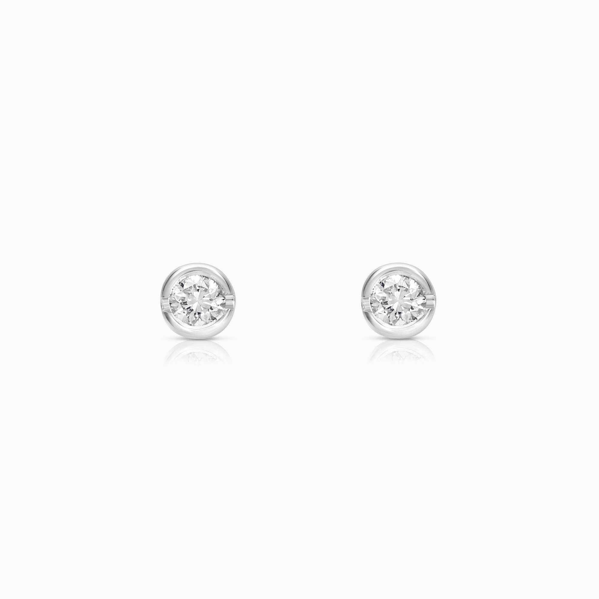 Solitärörhängen 0,14ct 18K vitguld