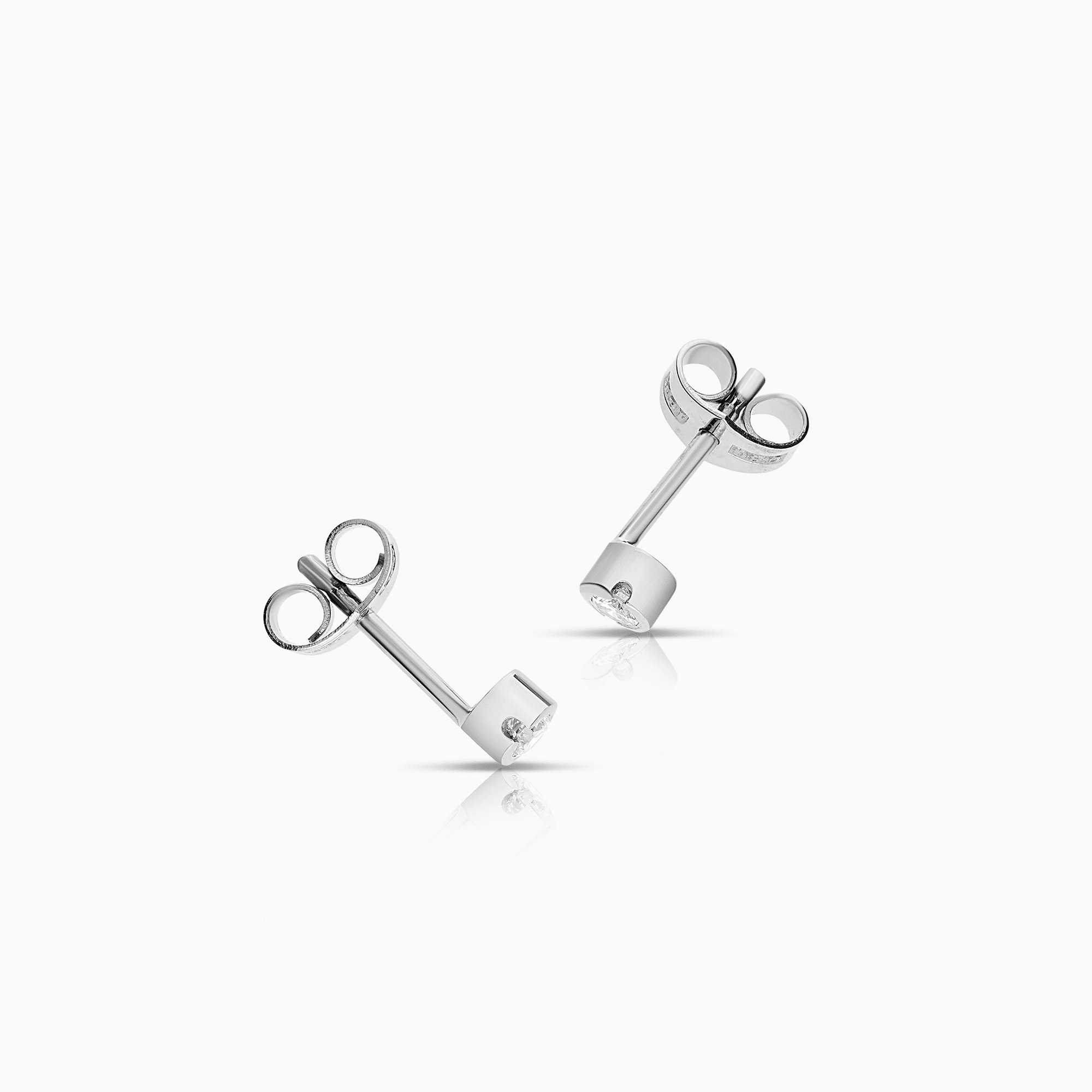 Solitärörhängen 0,14ct 18K vitguld