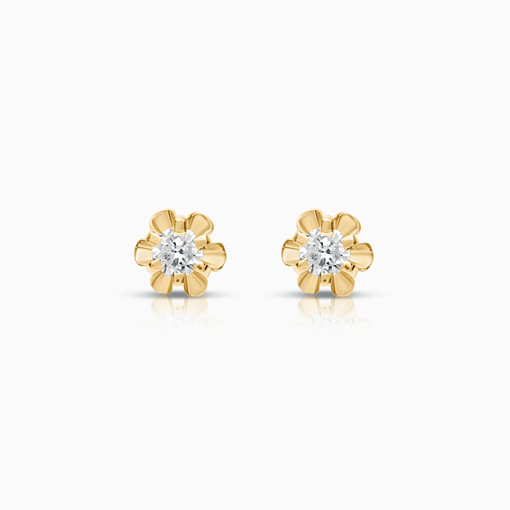 Solitärörhängen 0,05ct 18K guld