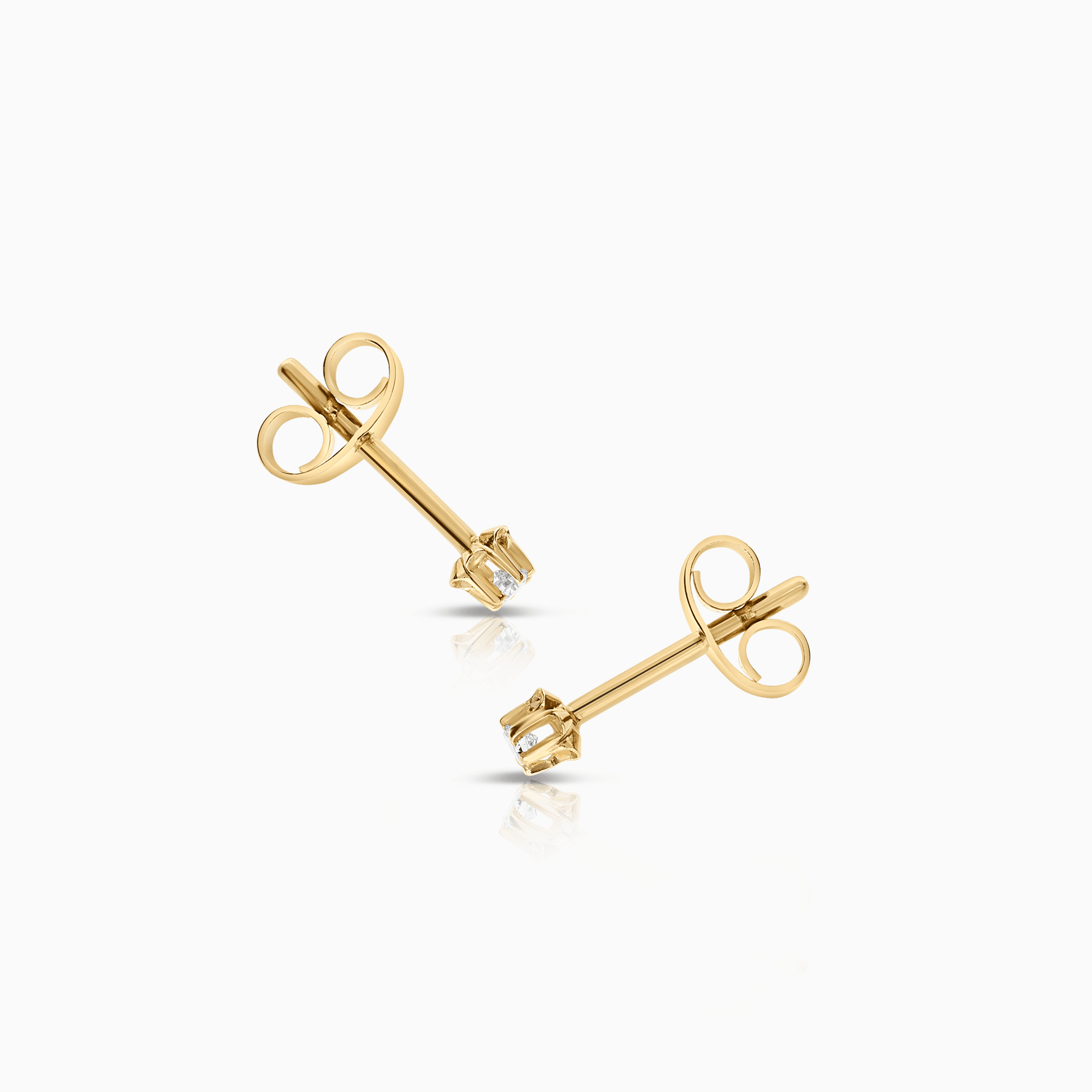 Solitärörhängen 0,05ct 18K guld